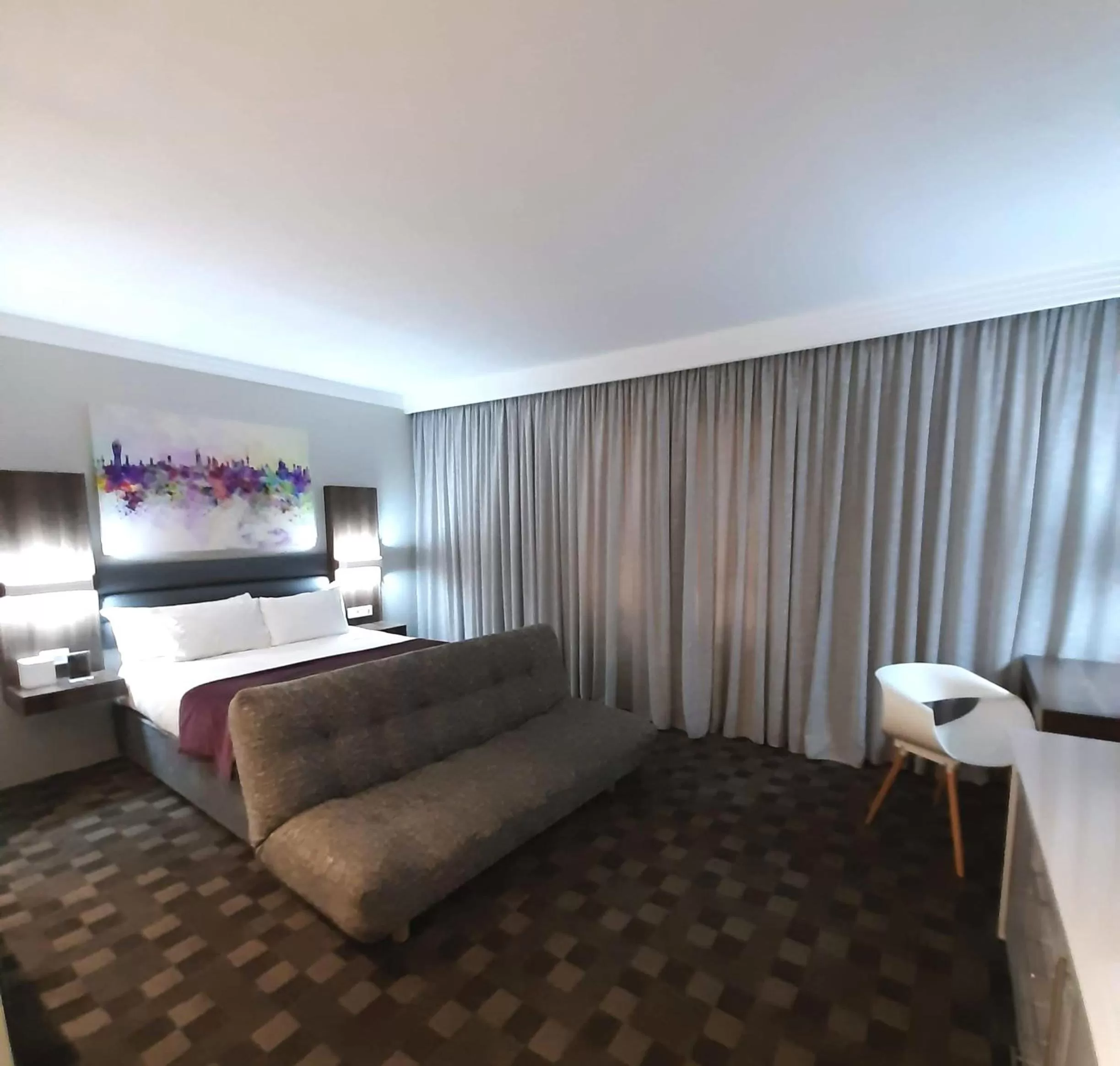 Bed in Palm Swift Luxury Accommodation