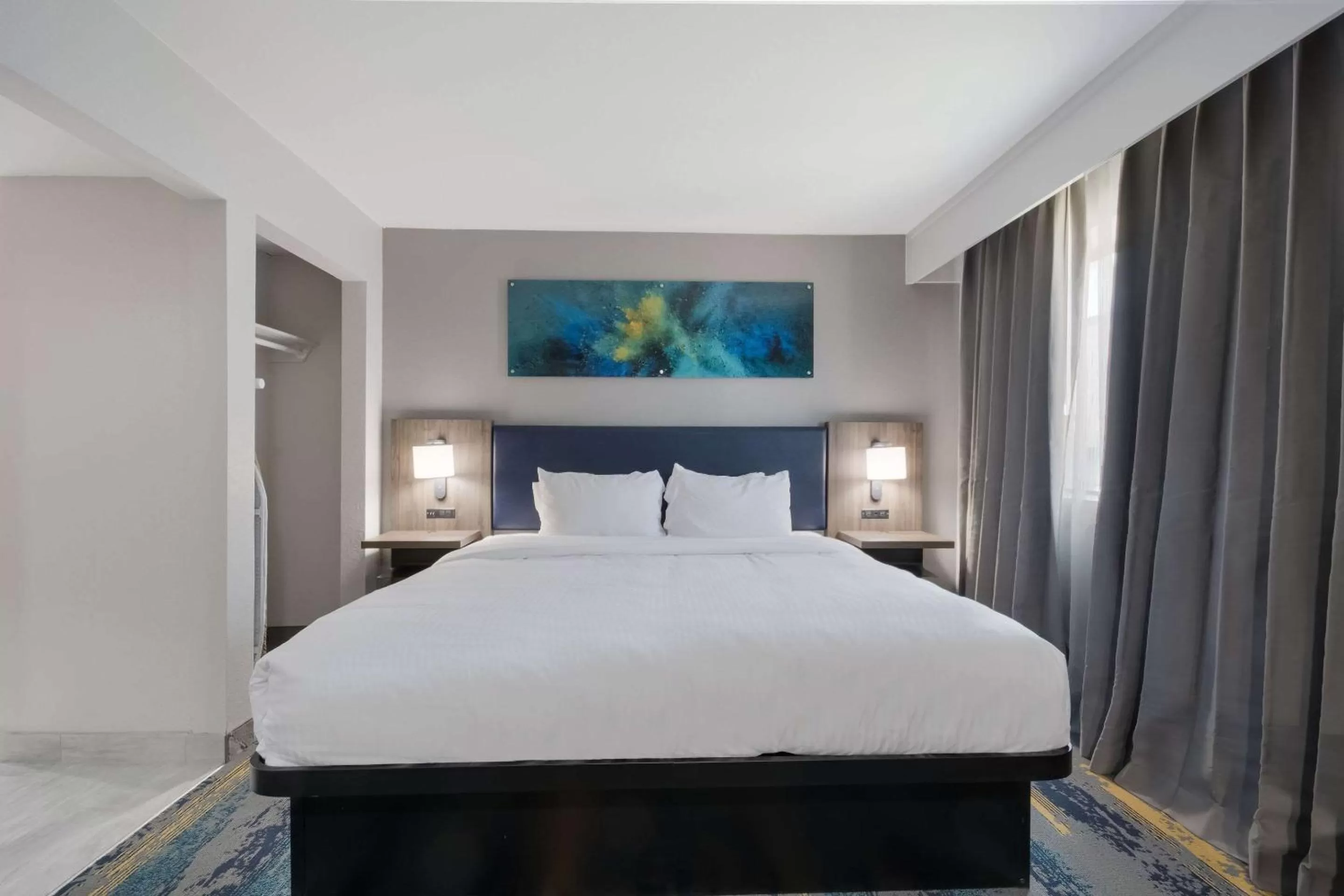 Bedroom in Clarion Pointe OKC Airport