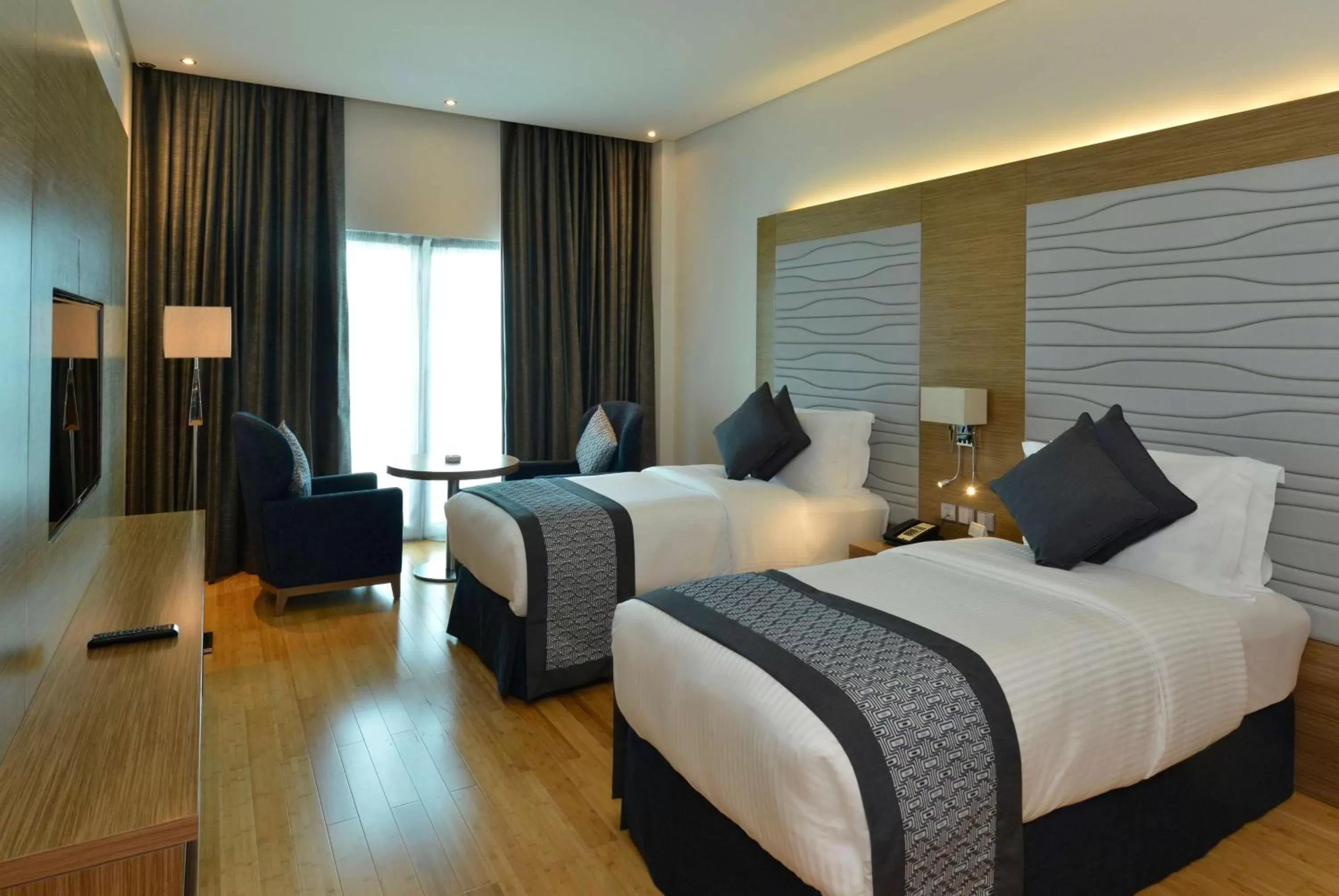 Shower, Bed in Ramada by Wyndham Manama City Centre