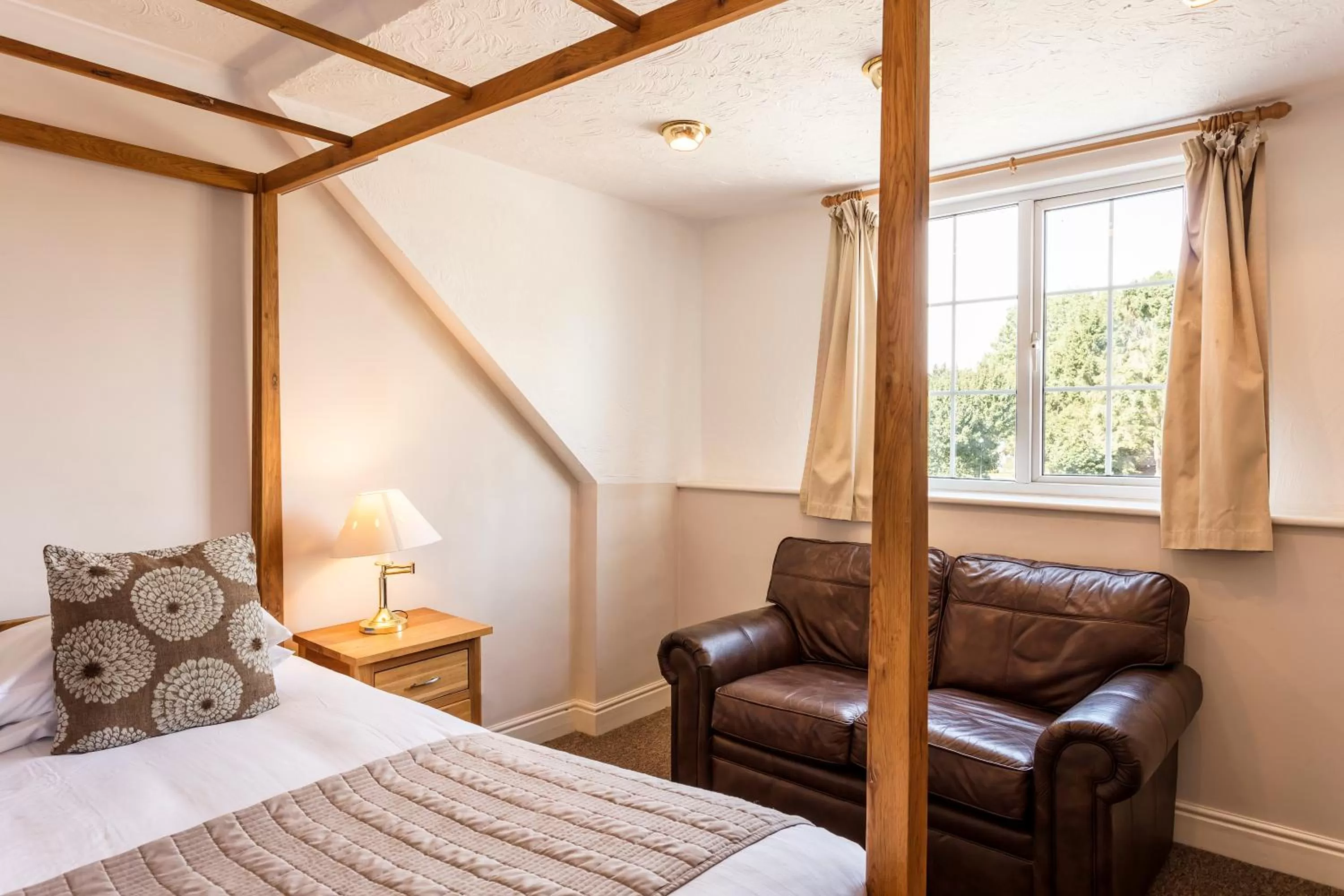 Seating area, Bed in Roydon Marina Village Hotel