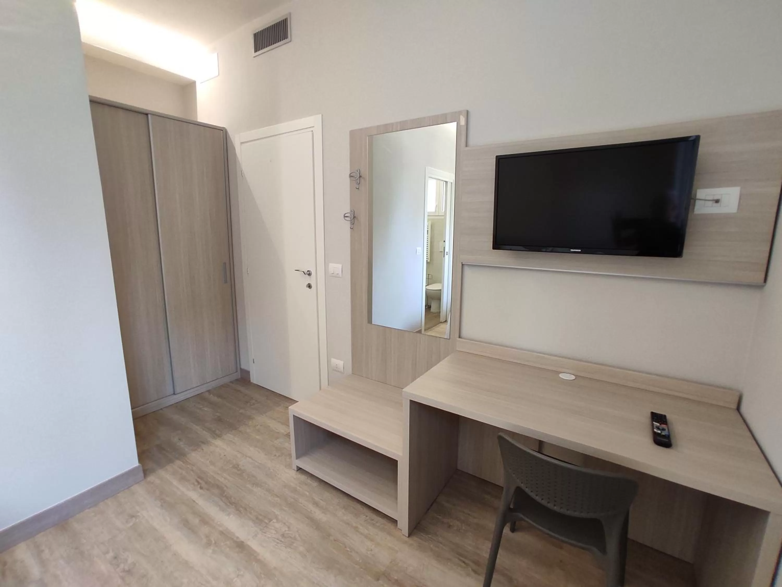 Bedroom, TV/Entertainment Center in ALBA RESIDENCE
