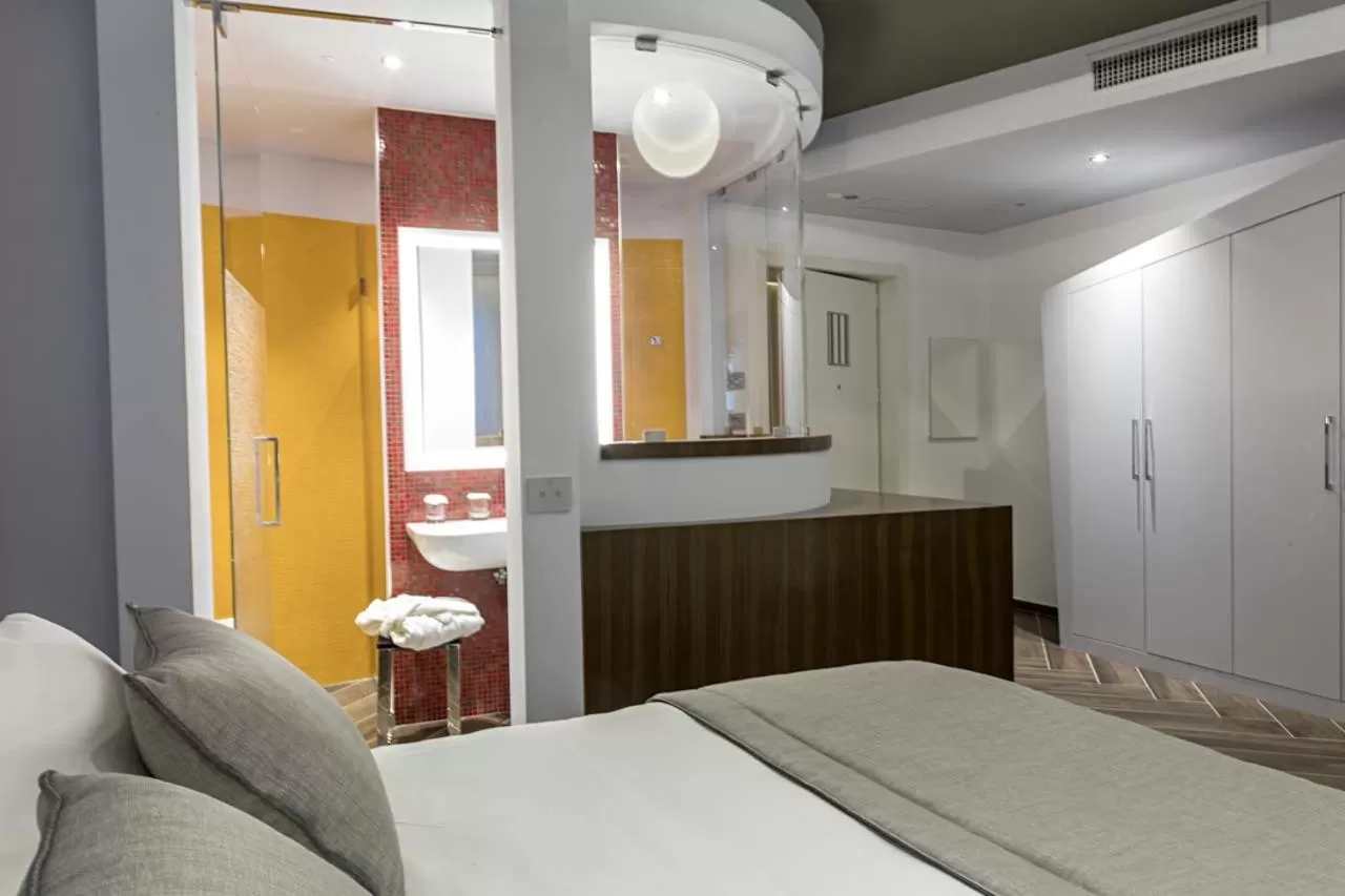 Bathroom, Bed in Borgo San Barbato Resort Spa & Golf