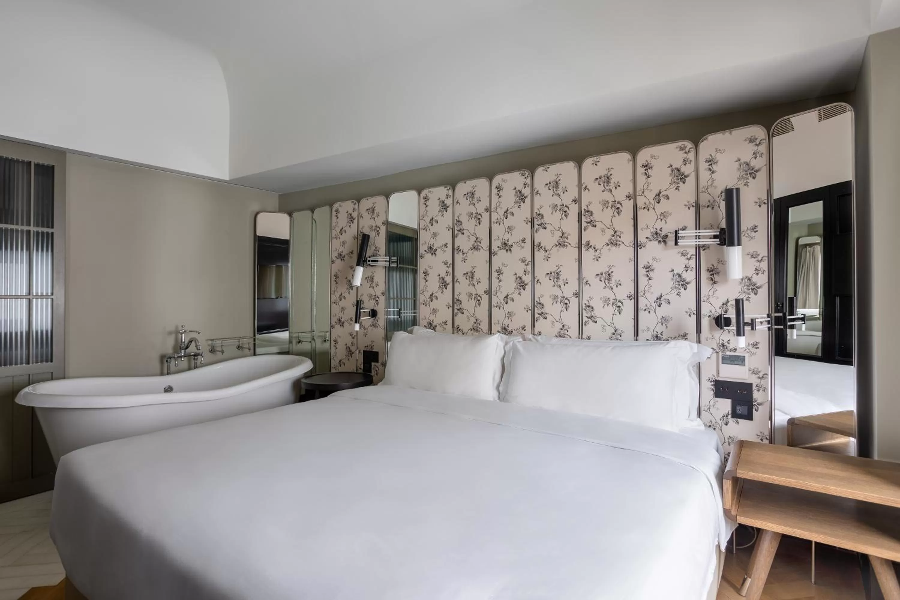 Bed in The Wings Hotels Collection