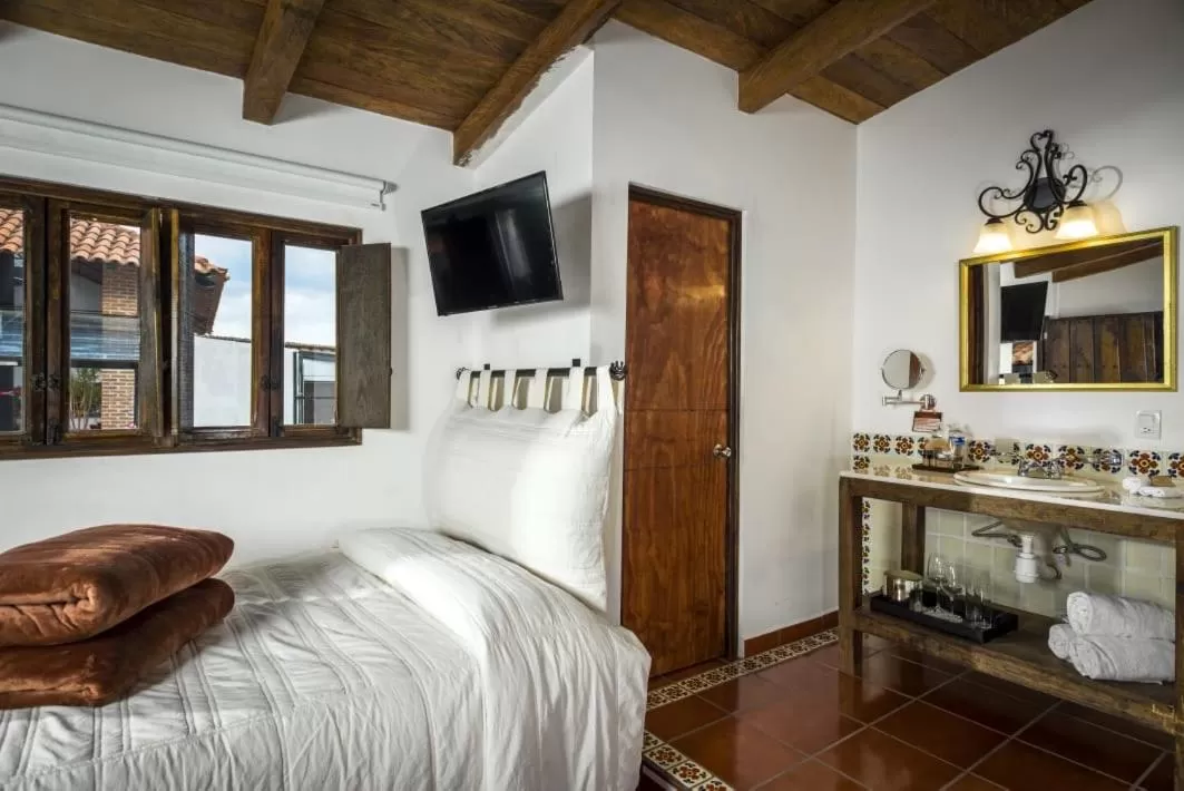 Photo of the whole room, Bed in Hotel Tapalpa de Mis Amores