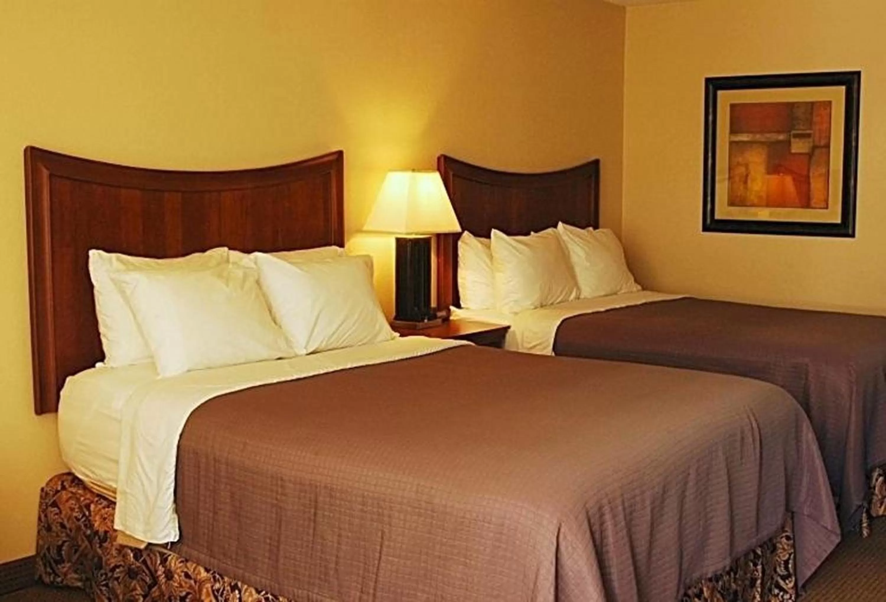 Bedroom in Trade Winds Central Inn