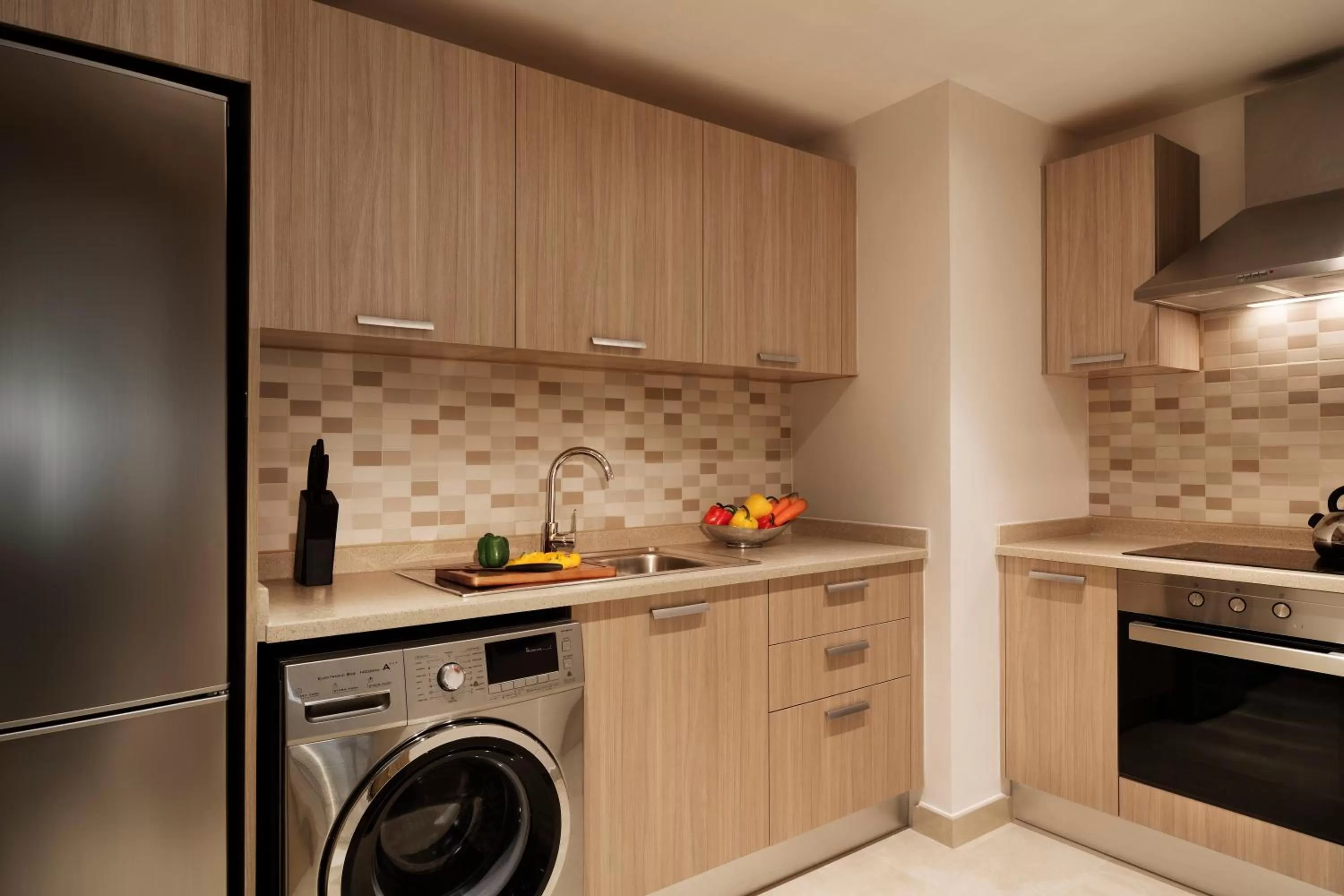 Kitchen or kitchenette in Al Najada Doha Hotel Apartments by Oaks