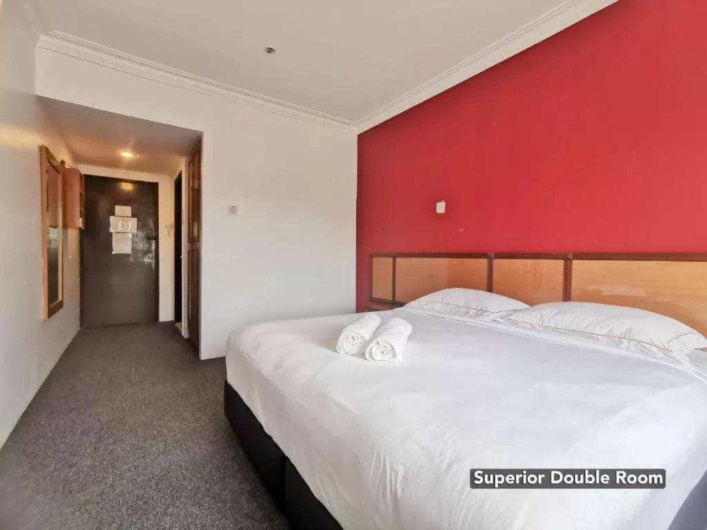 Bed in THE ZULEY HERITAGE HOTEL