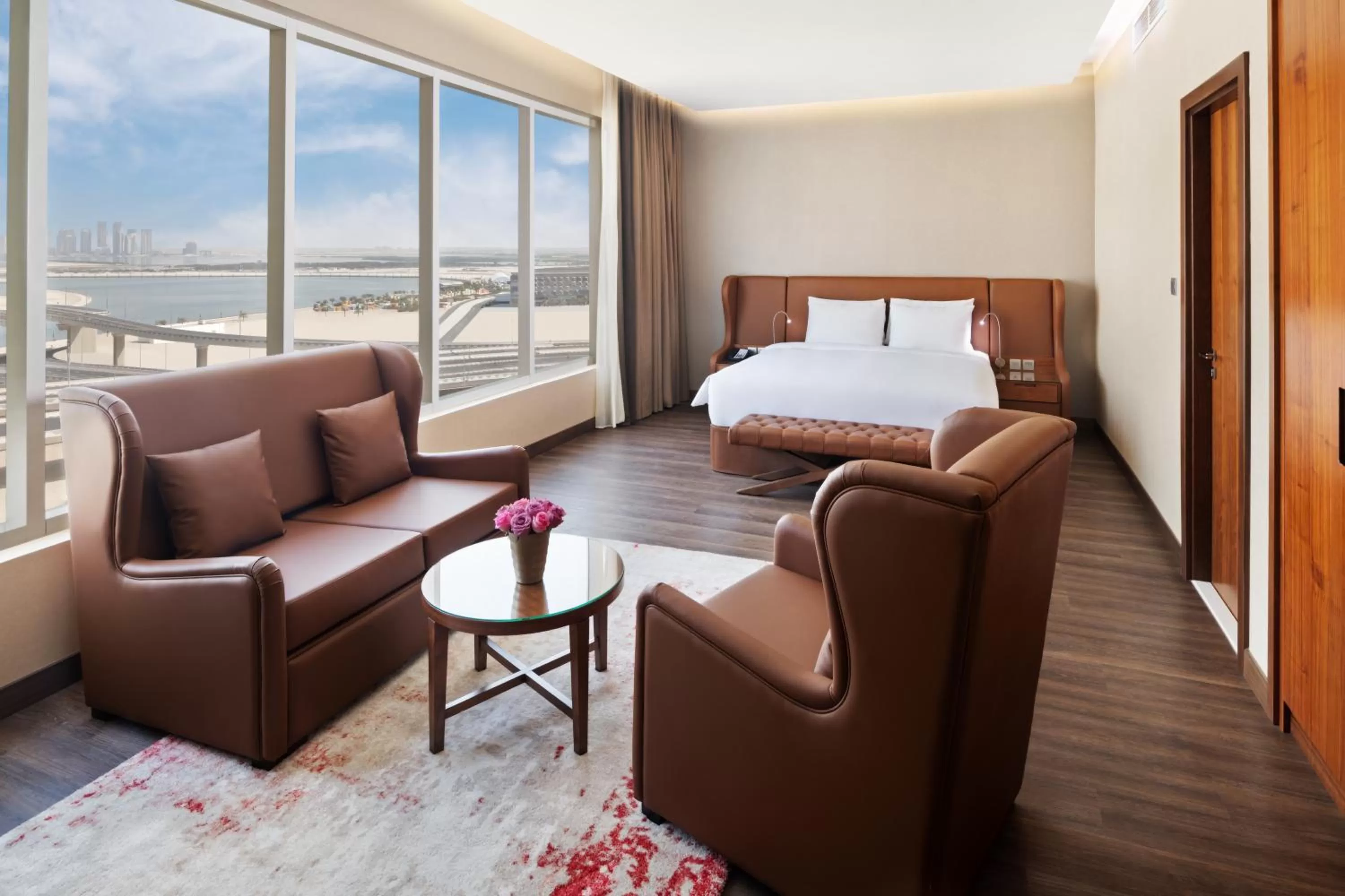 Seating area, Bed in Radisson Blu Hotel, Dubai Canal View