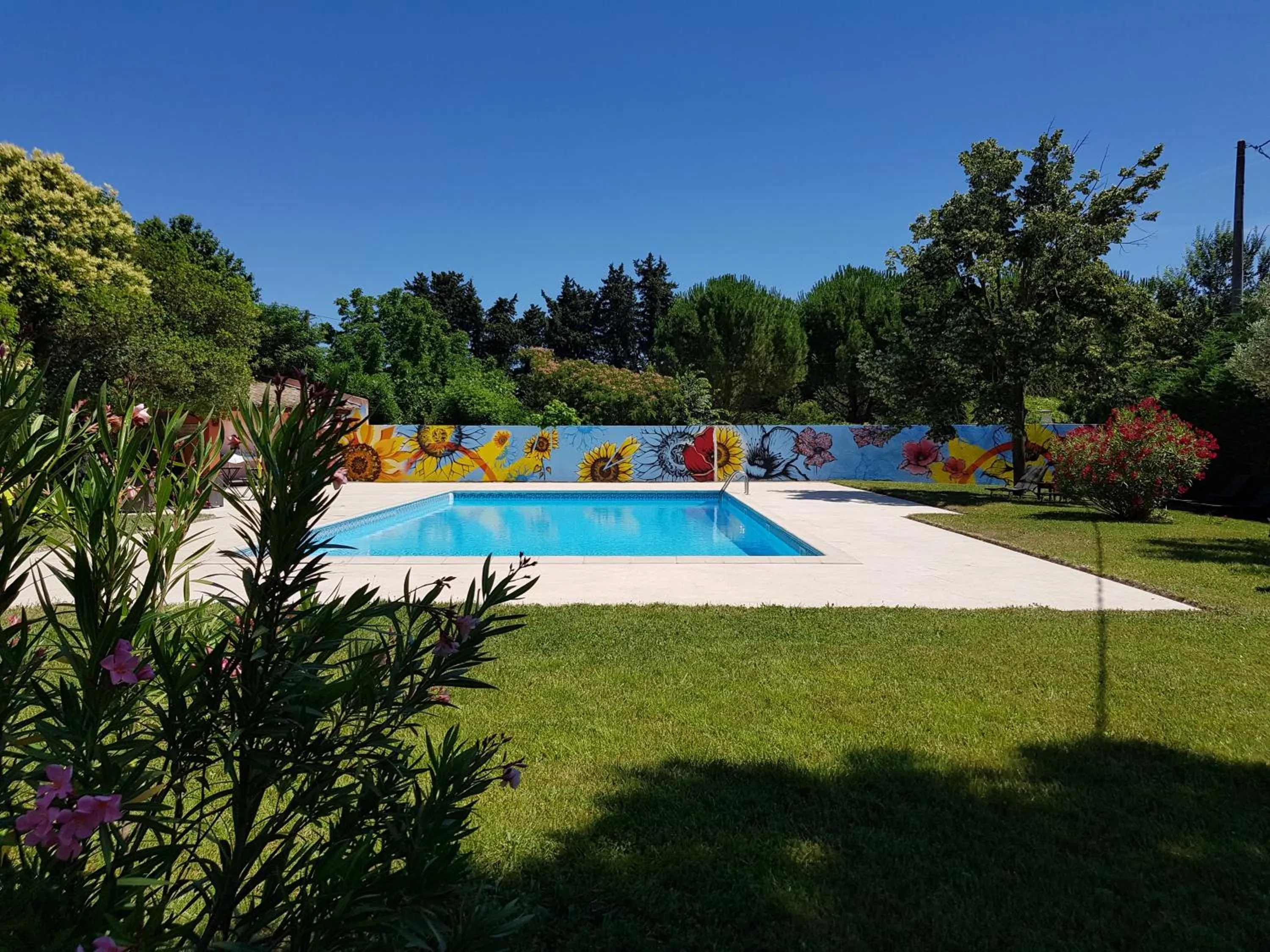Pool view in Logis Hotel la Ferme