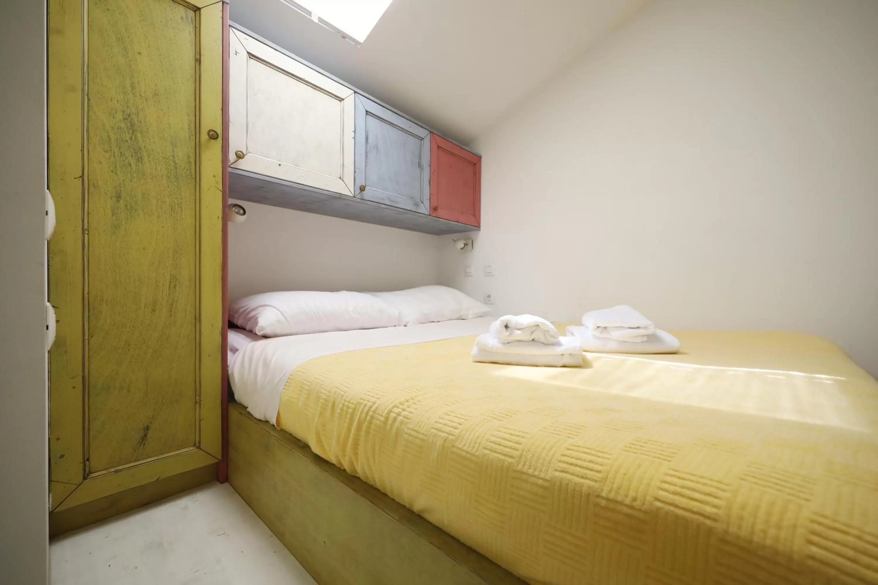 Bed in Central Apartments Integrated Hotel