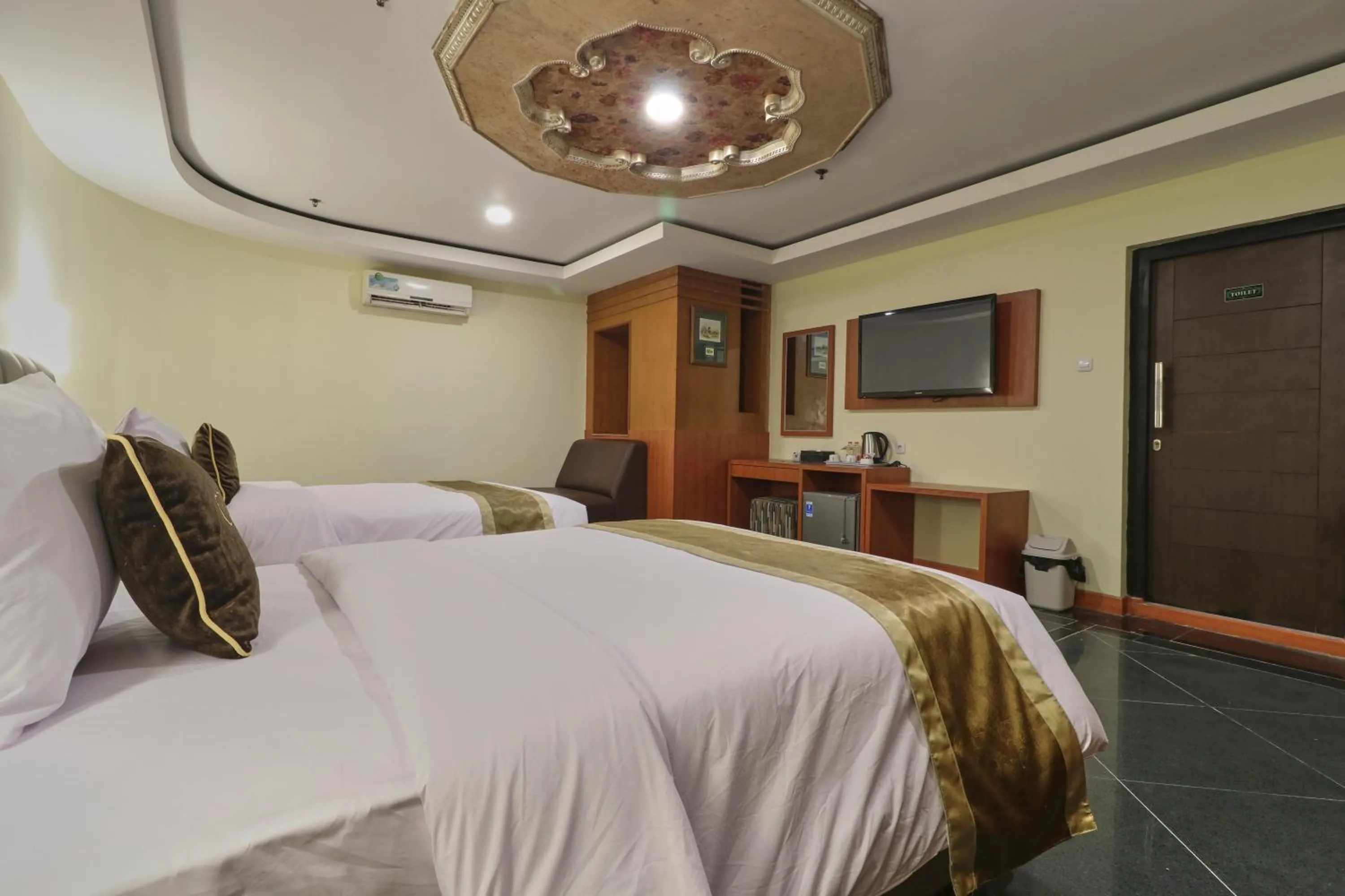 Bed in Coins Hotel Jakarta