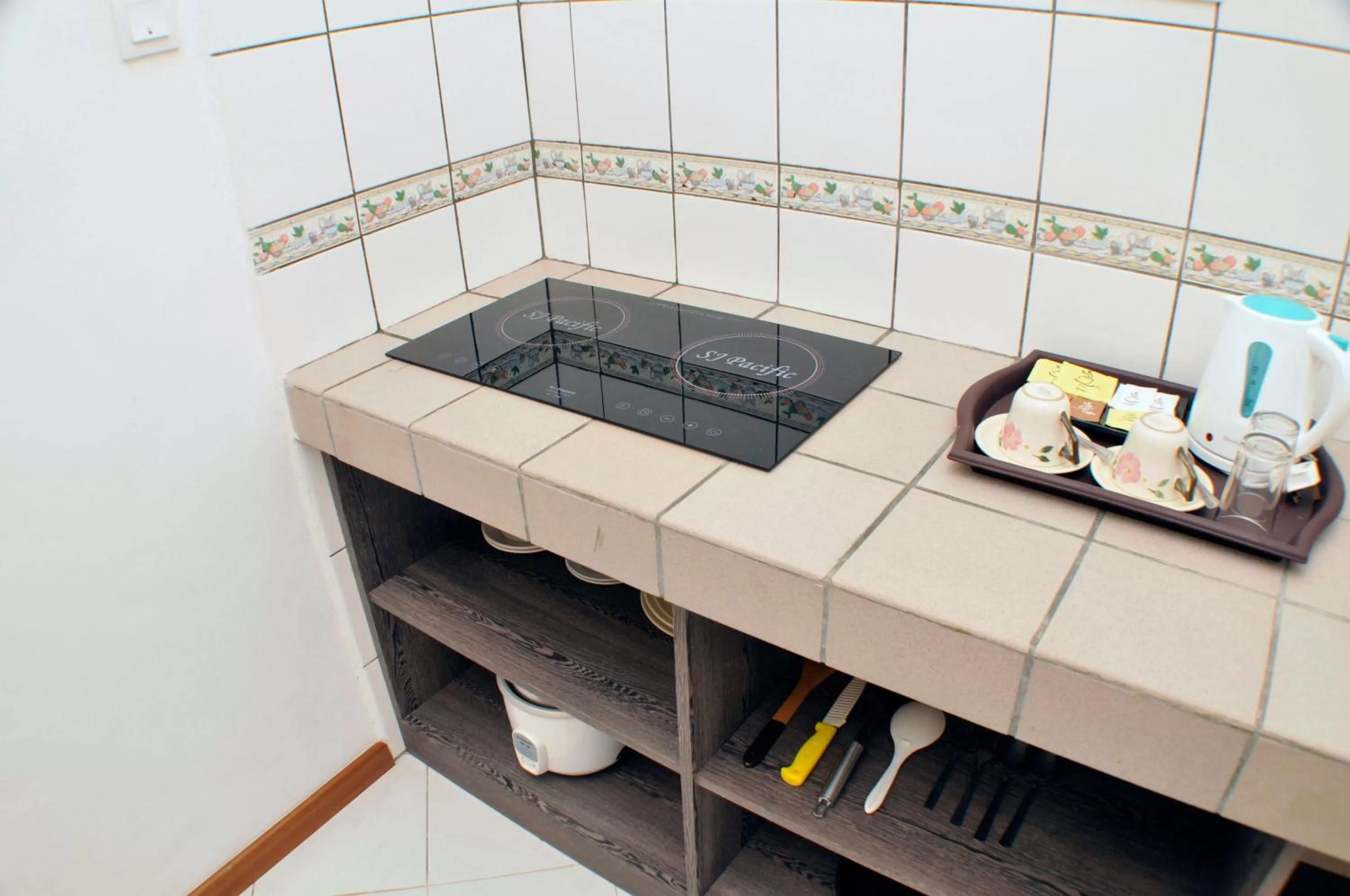 Kitchen or kitchenette in Promenade Service Apartment