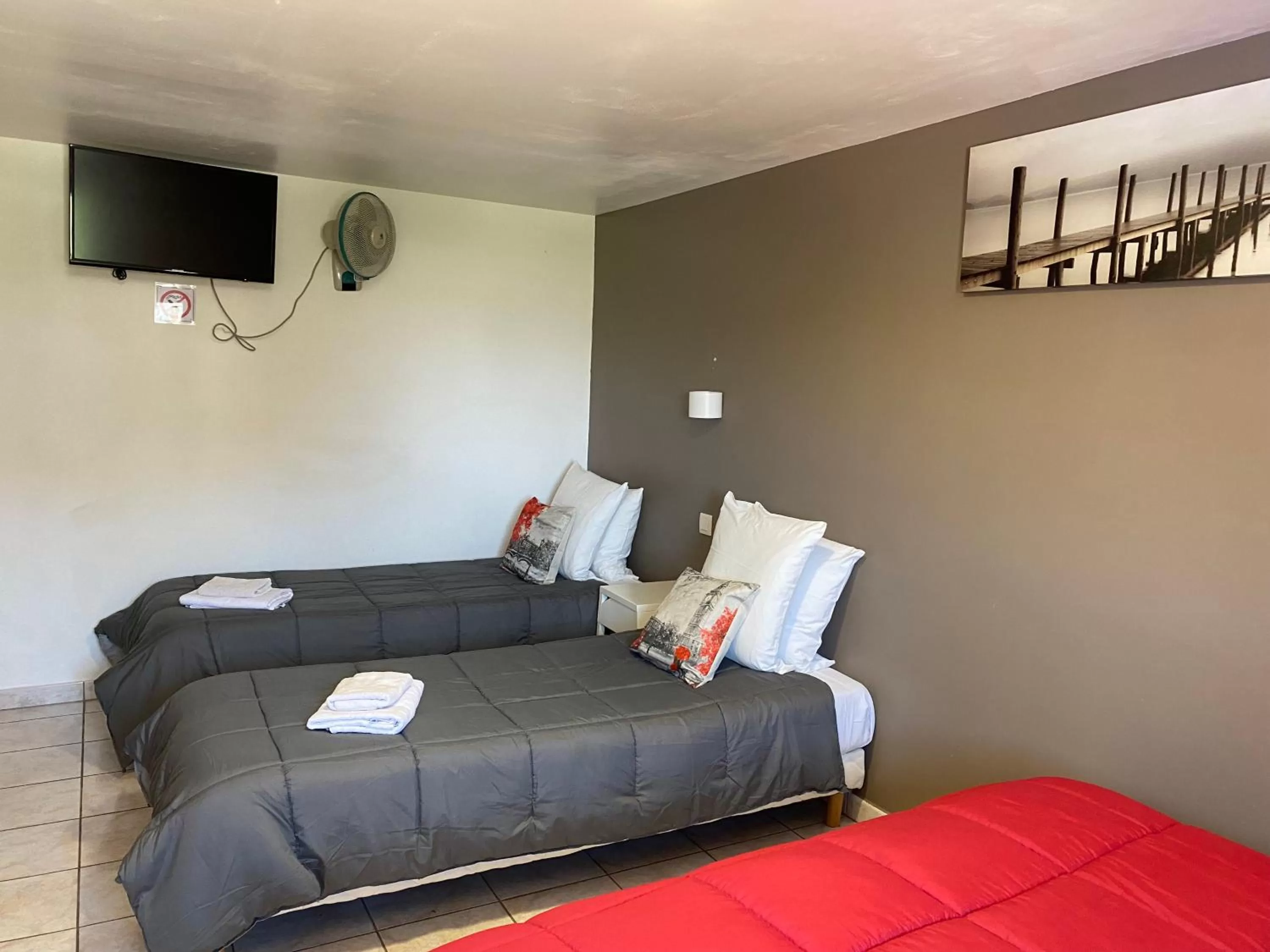 Bed in LOGIS Hôtel Restaurant La Chaumière