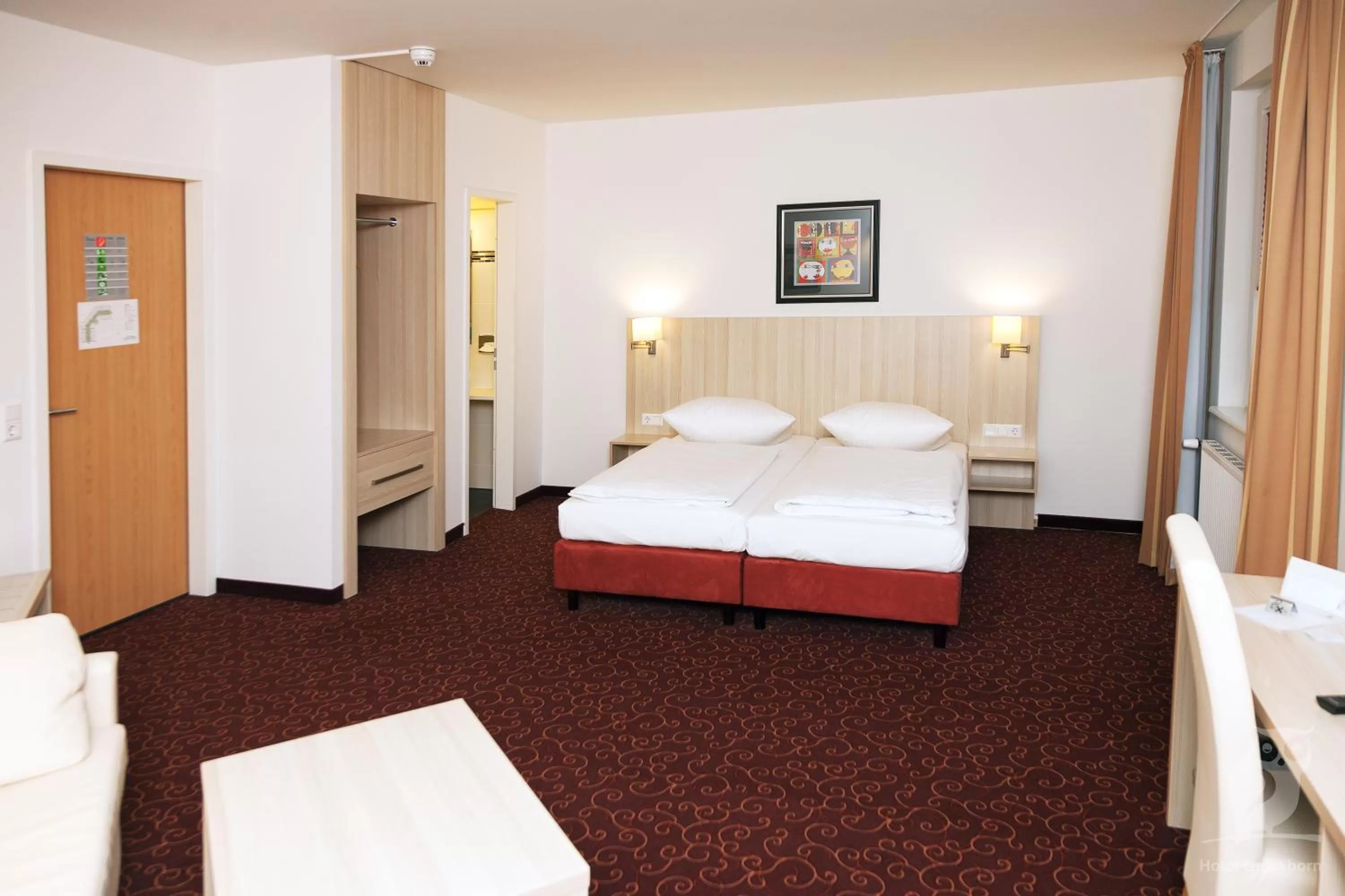 Photo of the whole room, Bed in Hotel Quickborn & Gästehaus Hesse