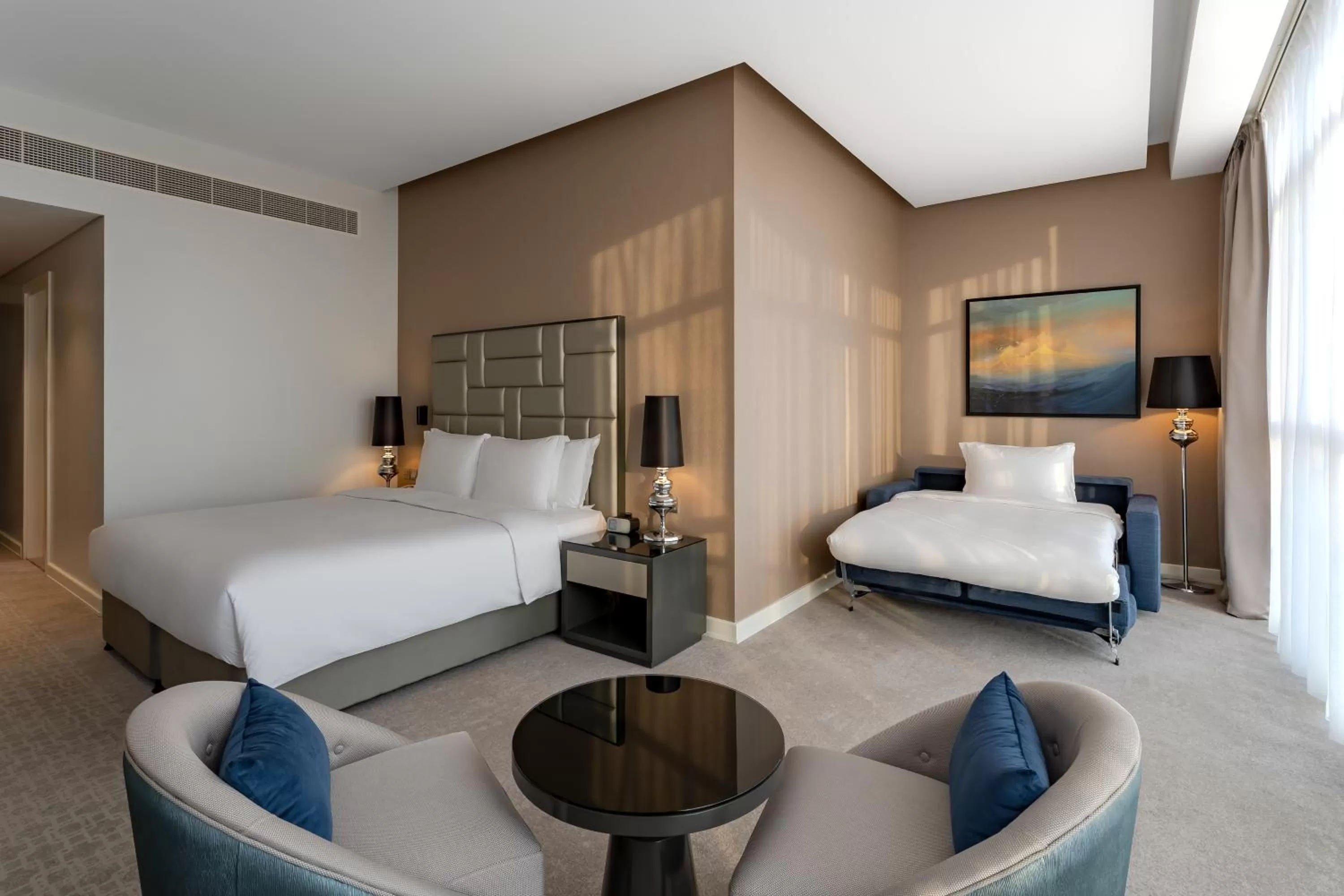 Bedroom, Bed in Radisson Dubai Damac Hills