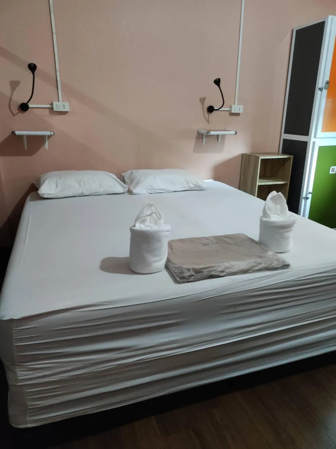 towels, Bed in Urban Hostel Bangkok