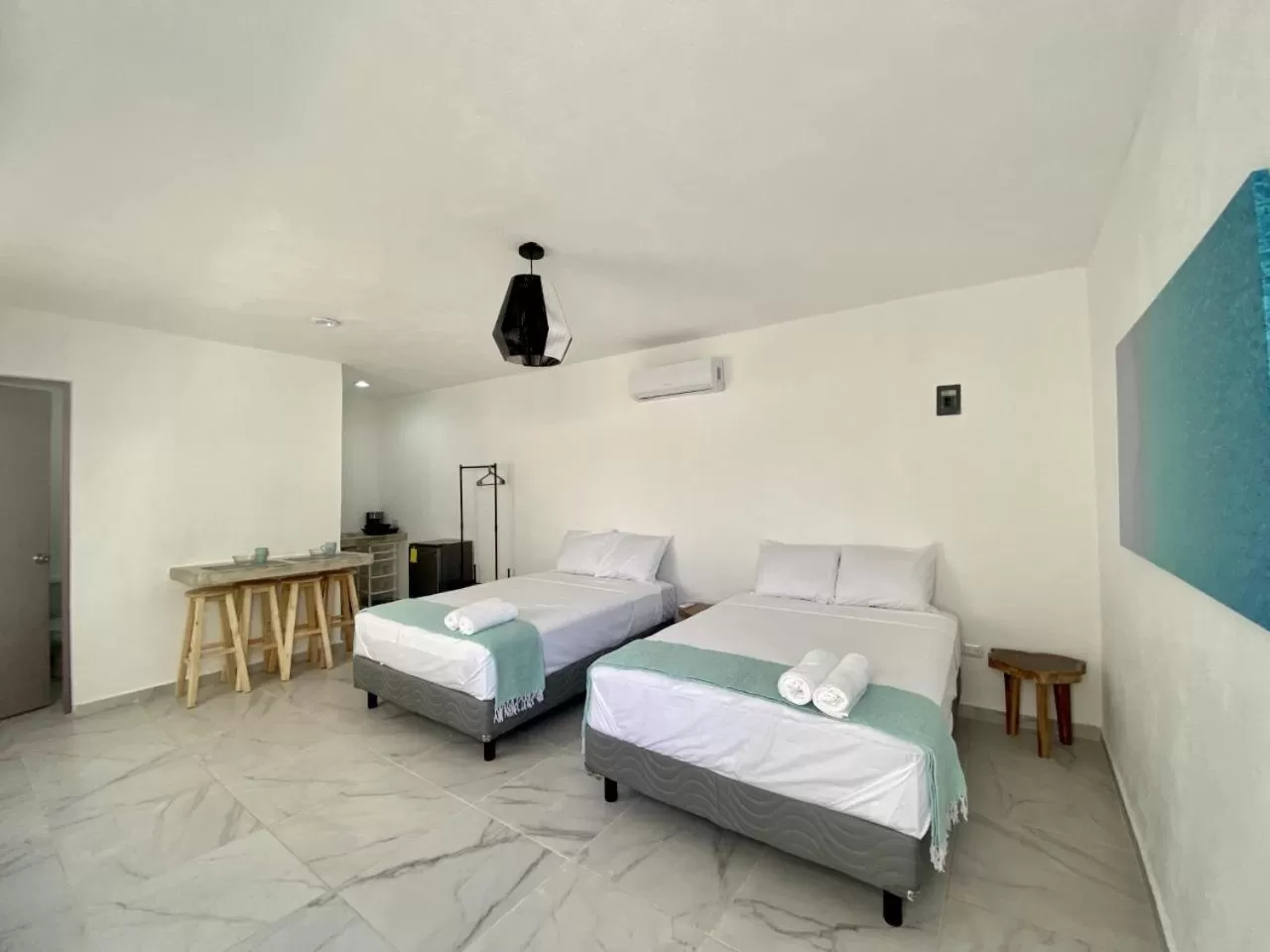 Bed in Casa Colibrí El Cuyo