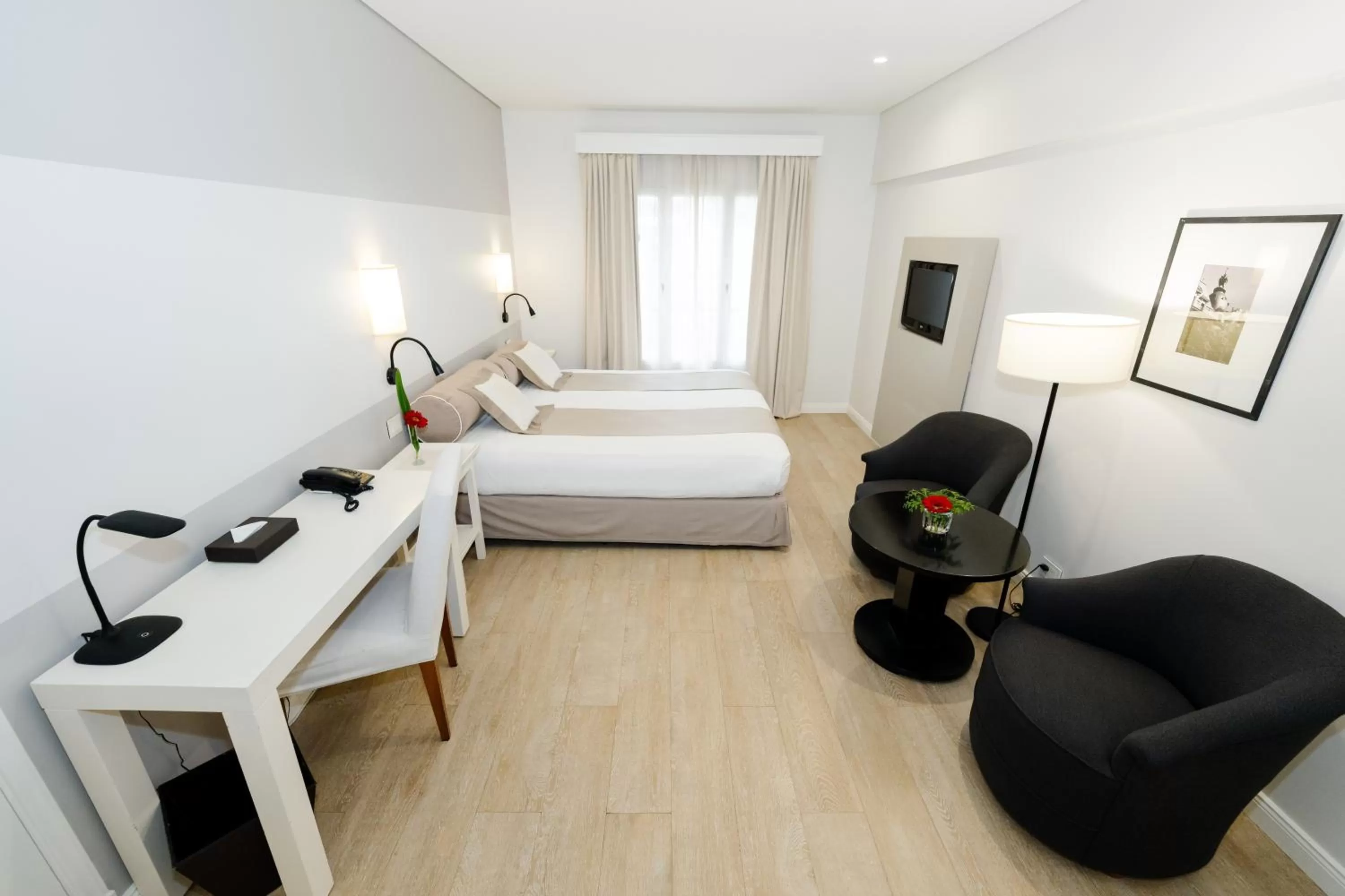 Bed in Loi Suites Recoleta Hotel