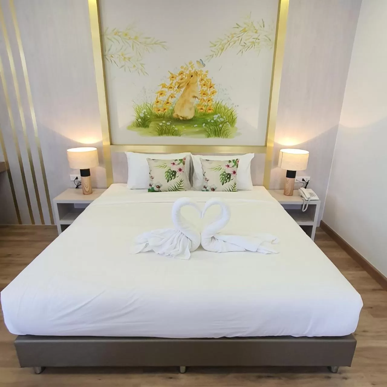 Bed in Lueangchan Orchid Hotel