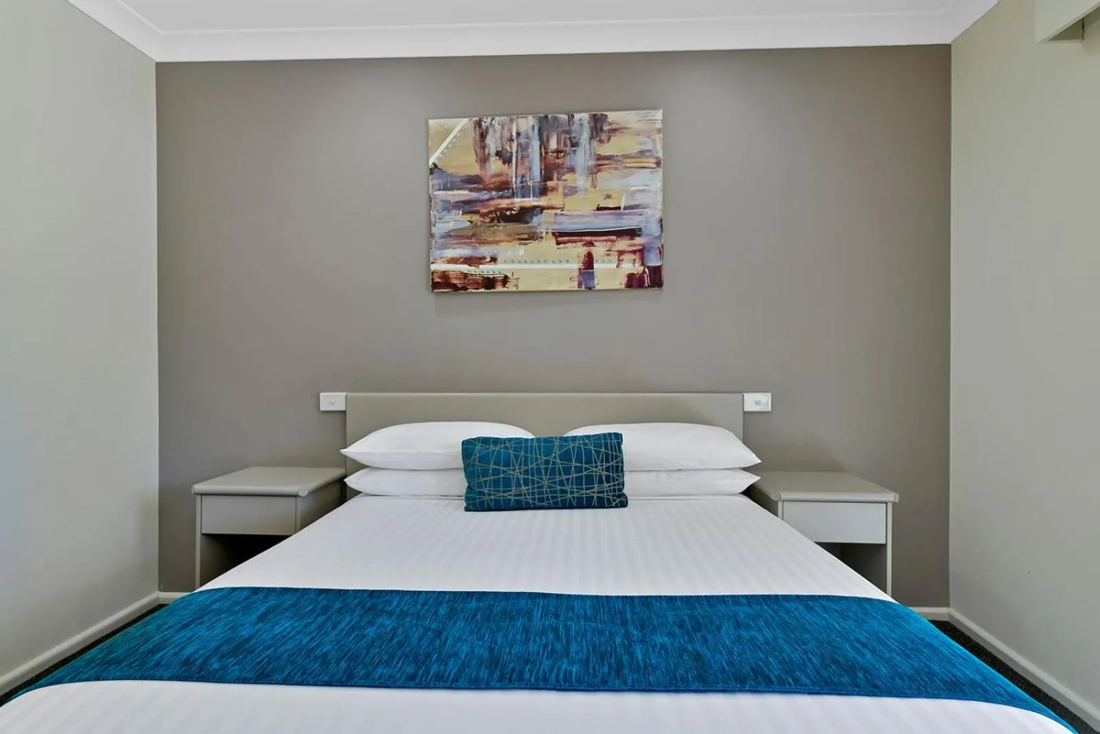 Bed in Central Caleula Motor Lodge