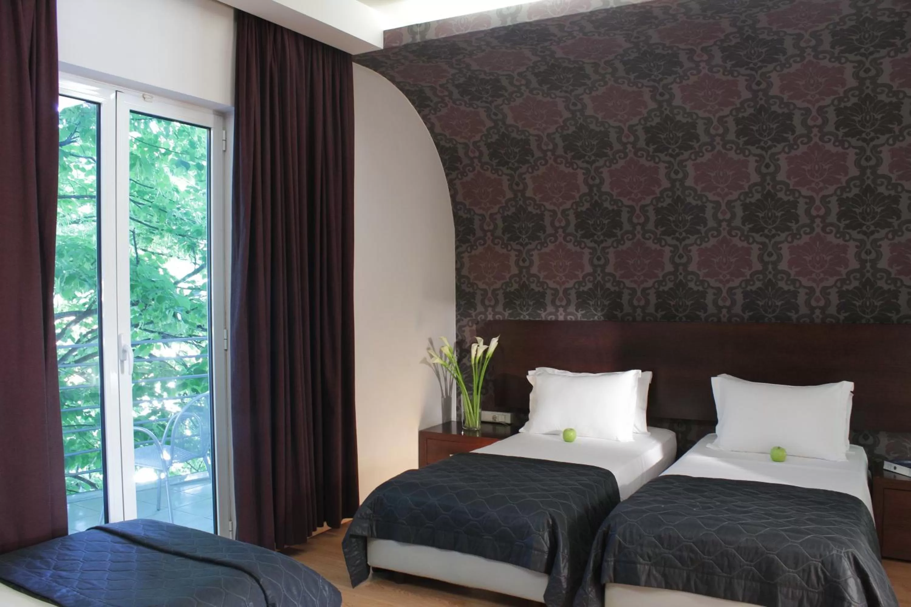 Bed in Galaxy Art Hotel