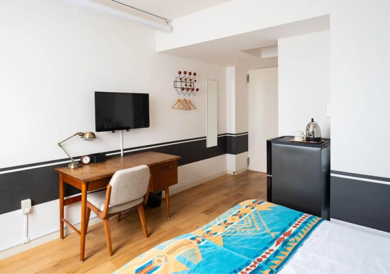 TV and multimedia, Bed in Hotel Graphy Nezu