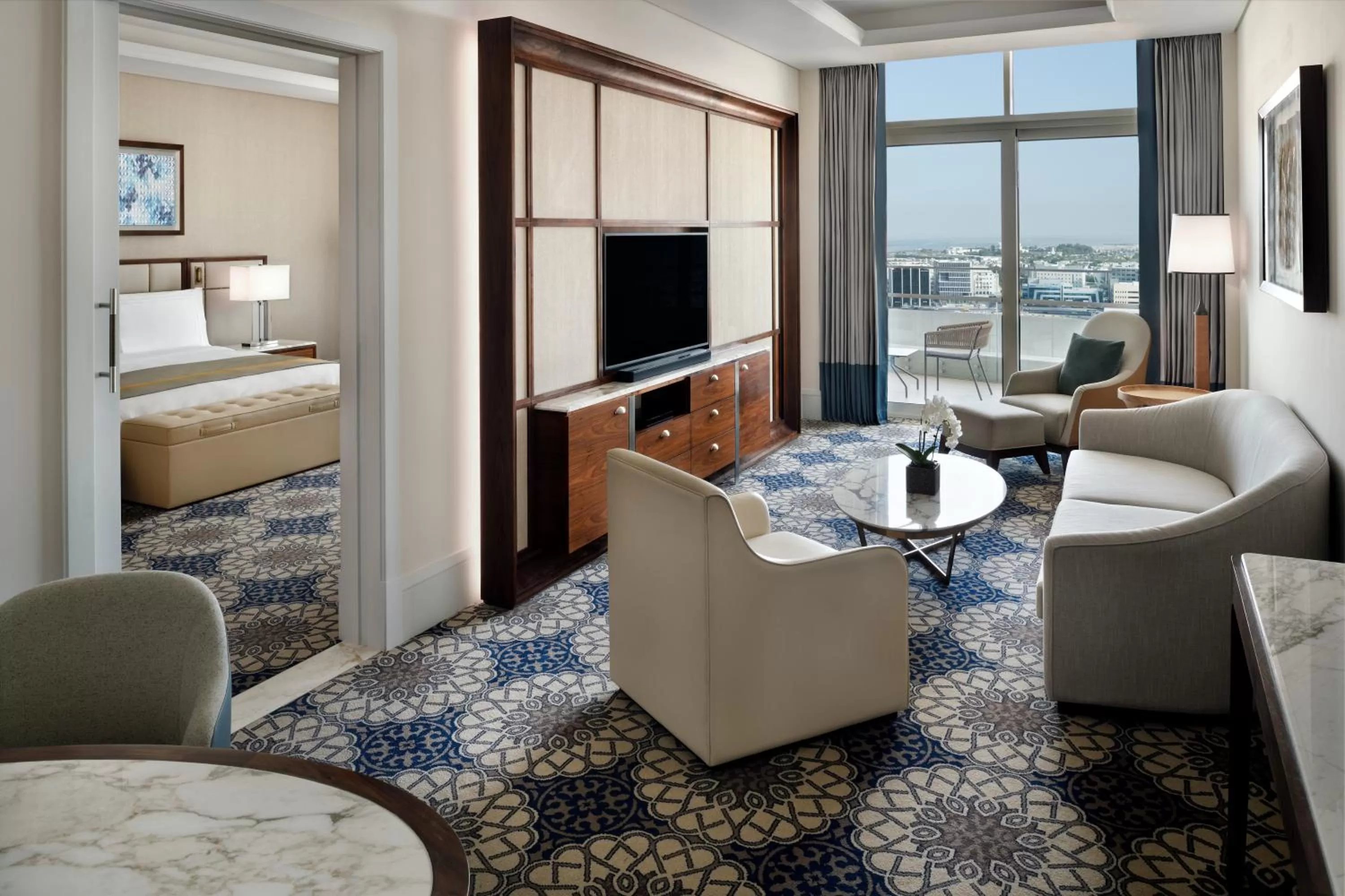 Communal lounge/ TV room, Bed in Grand Plaza Mövenpick Media City