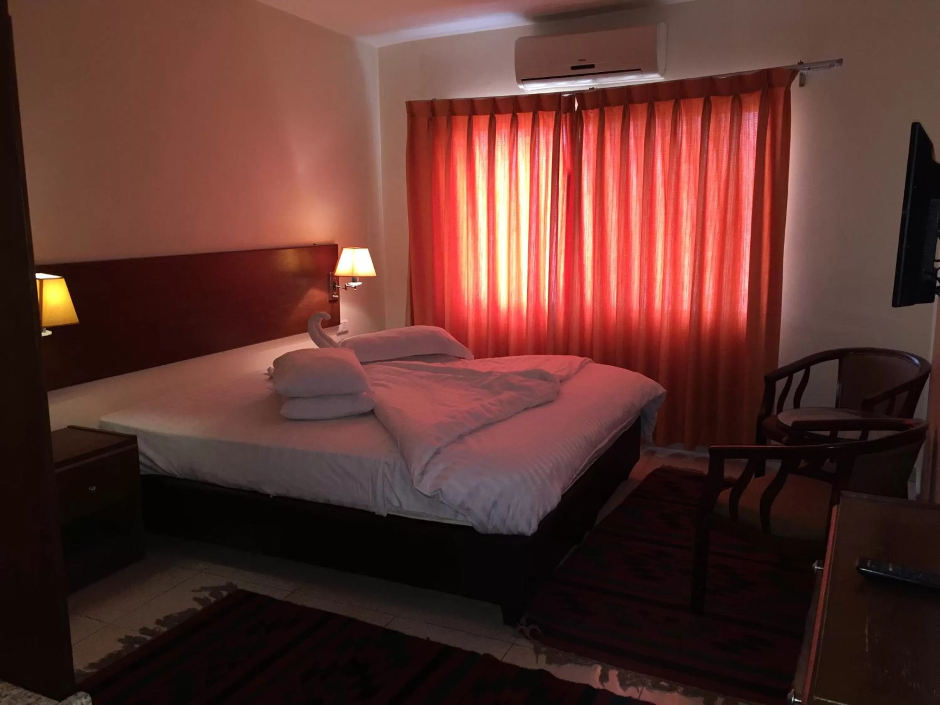 Bed in Zaina Plaza Hotel