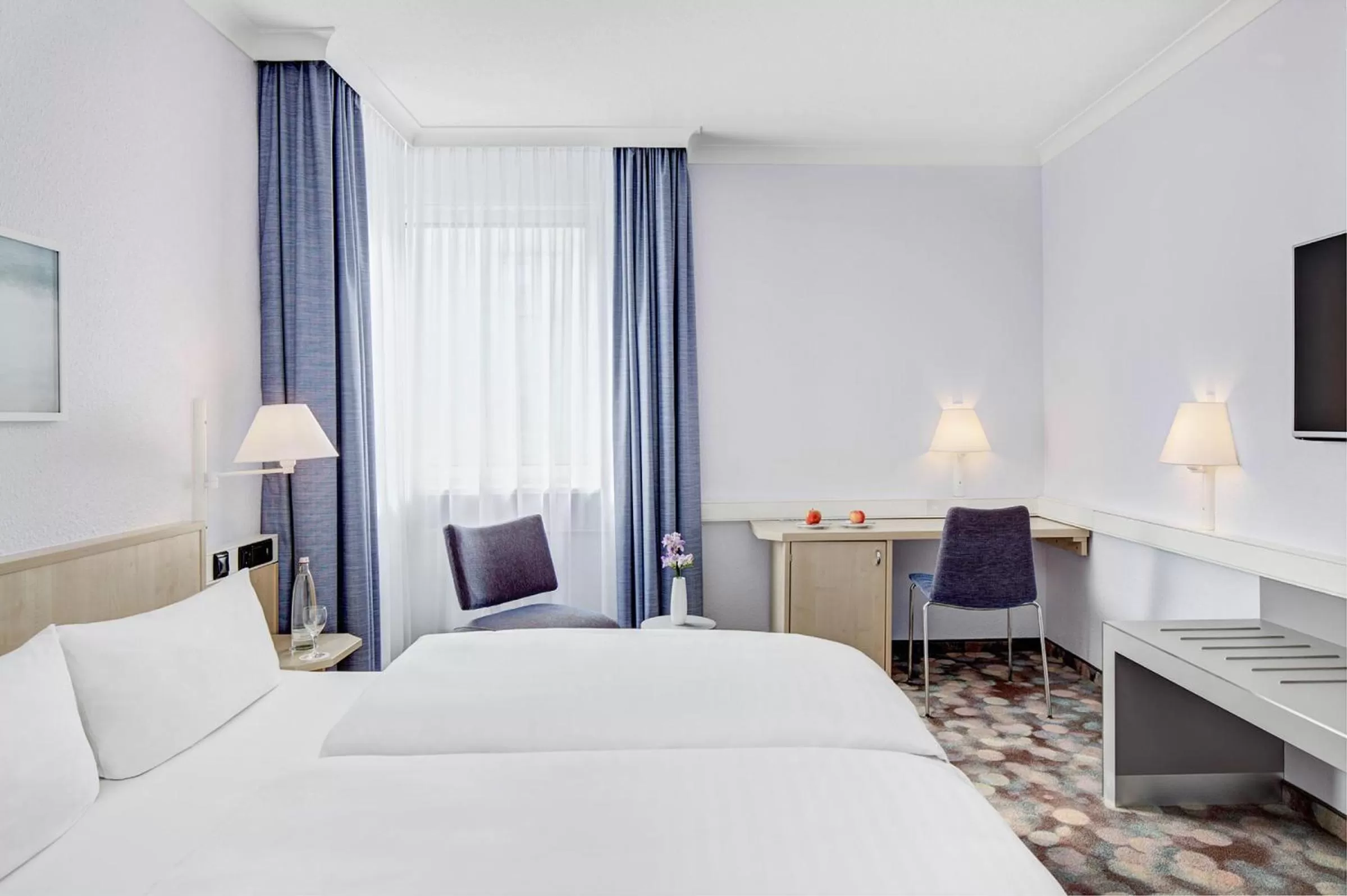 Photo of the whole room, Bed in IntercityHotel Rostock