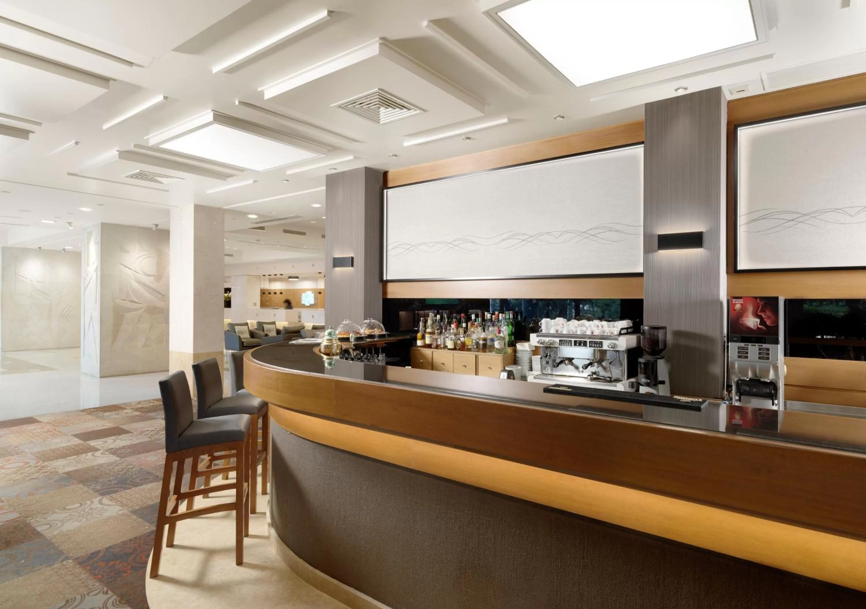 Lounge or bar in Holiday Inn Athens Attica Av, Airport W. by IHG
