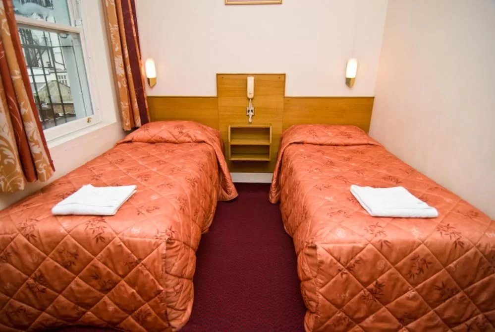 Bed in Alexandra Hotel