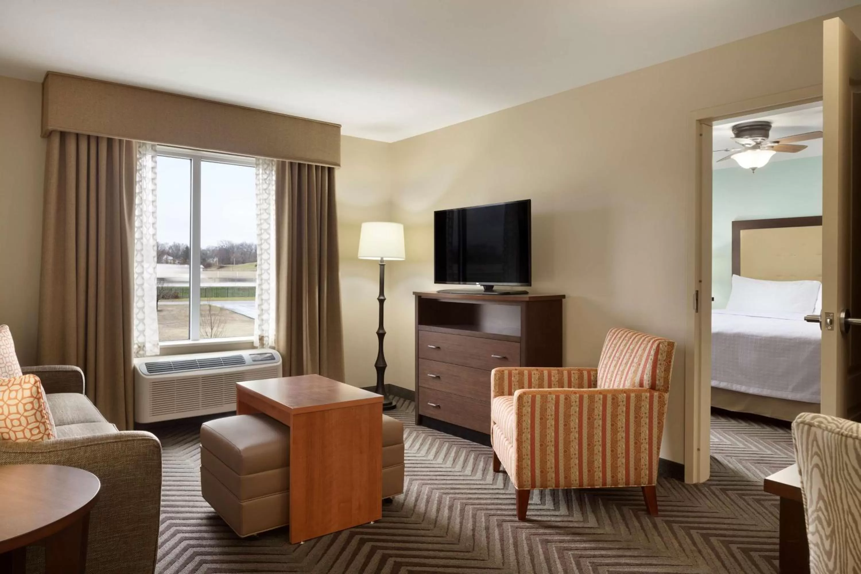 Bed in Homewood Suites by Hilton Kalamazoo-Portage