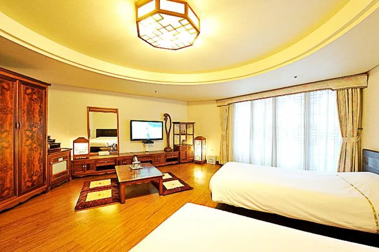 Bed in Jeju Pacific Hotel