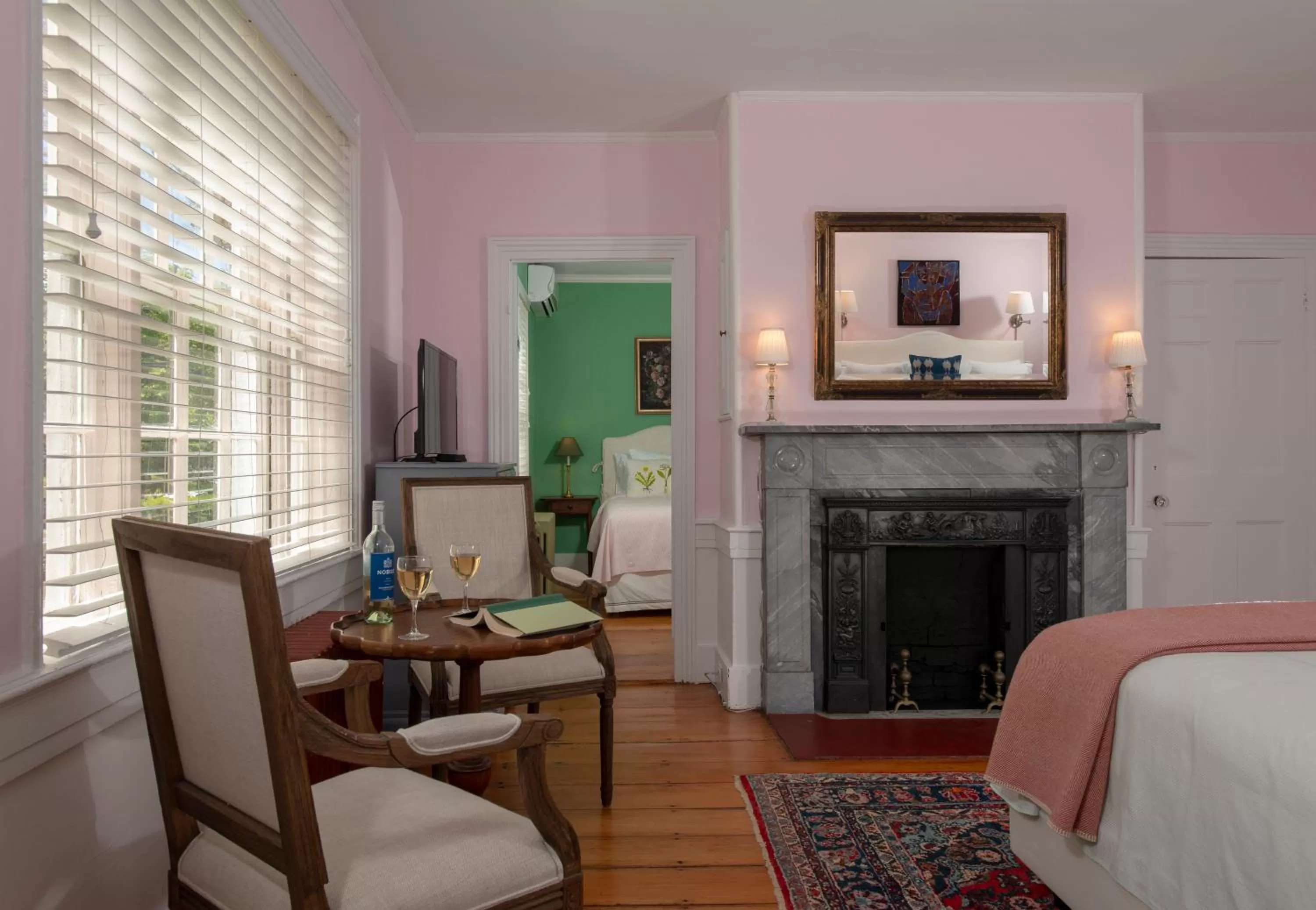 Bed, Seating Area in Village Inn