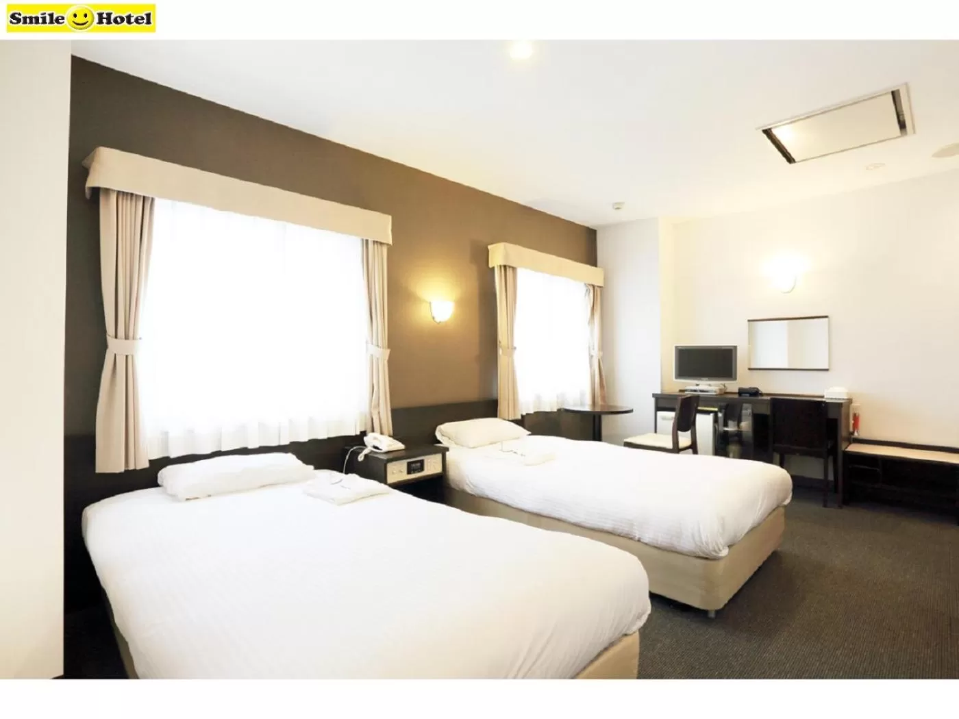 Bed in Smile Hotel Asahikawa