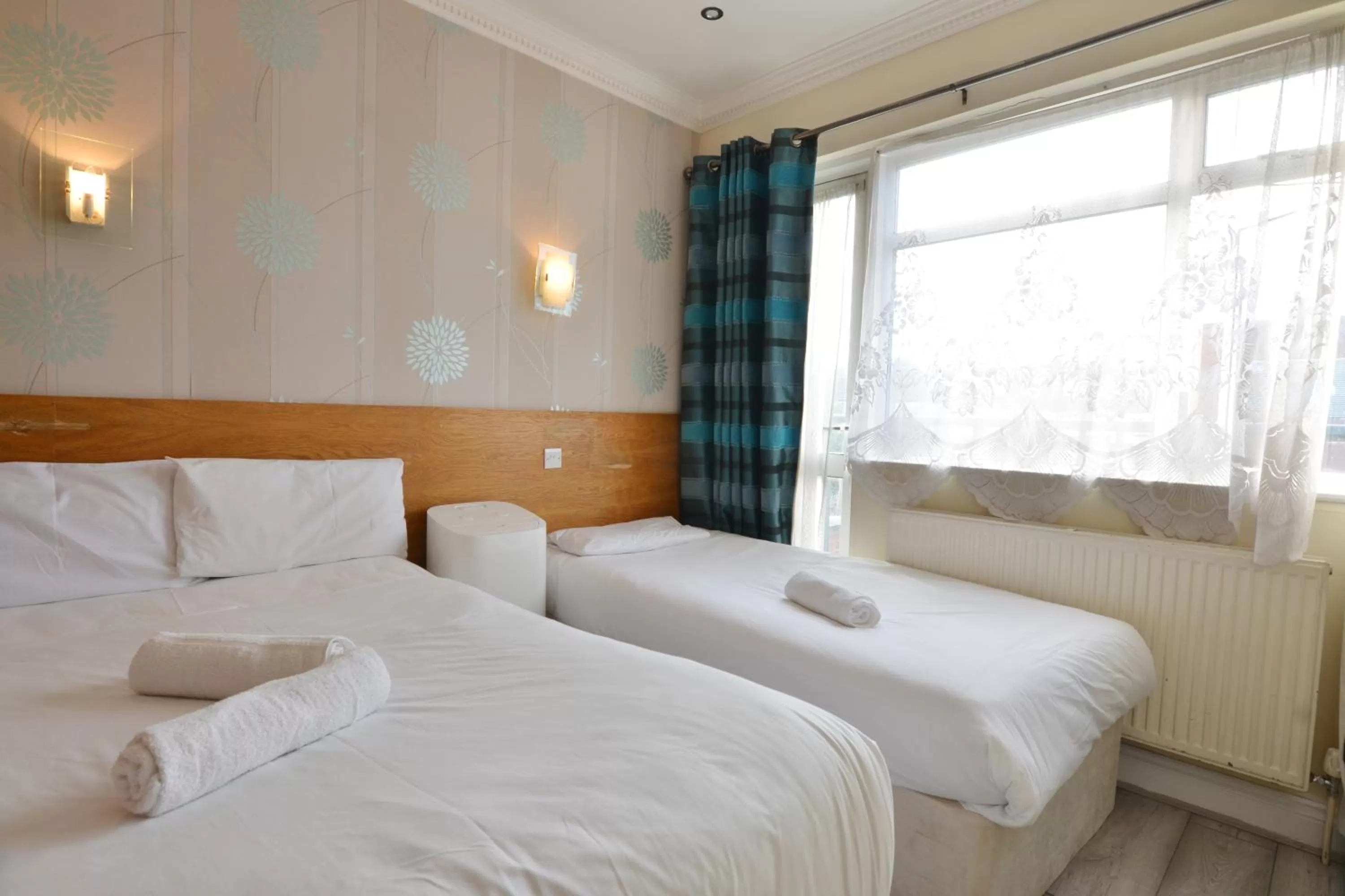 Bed in Anchor Guest House