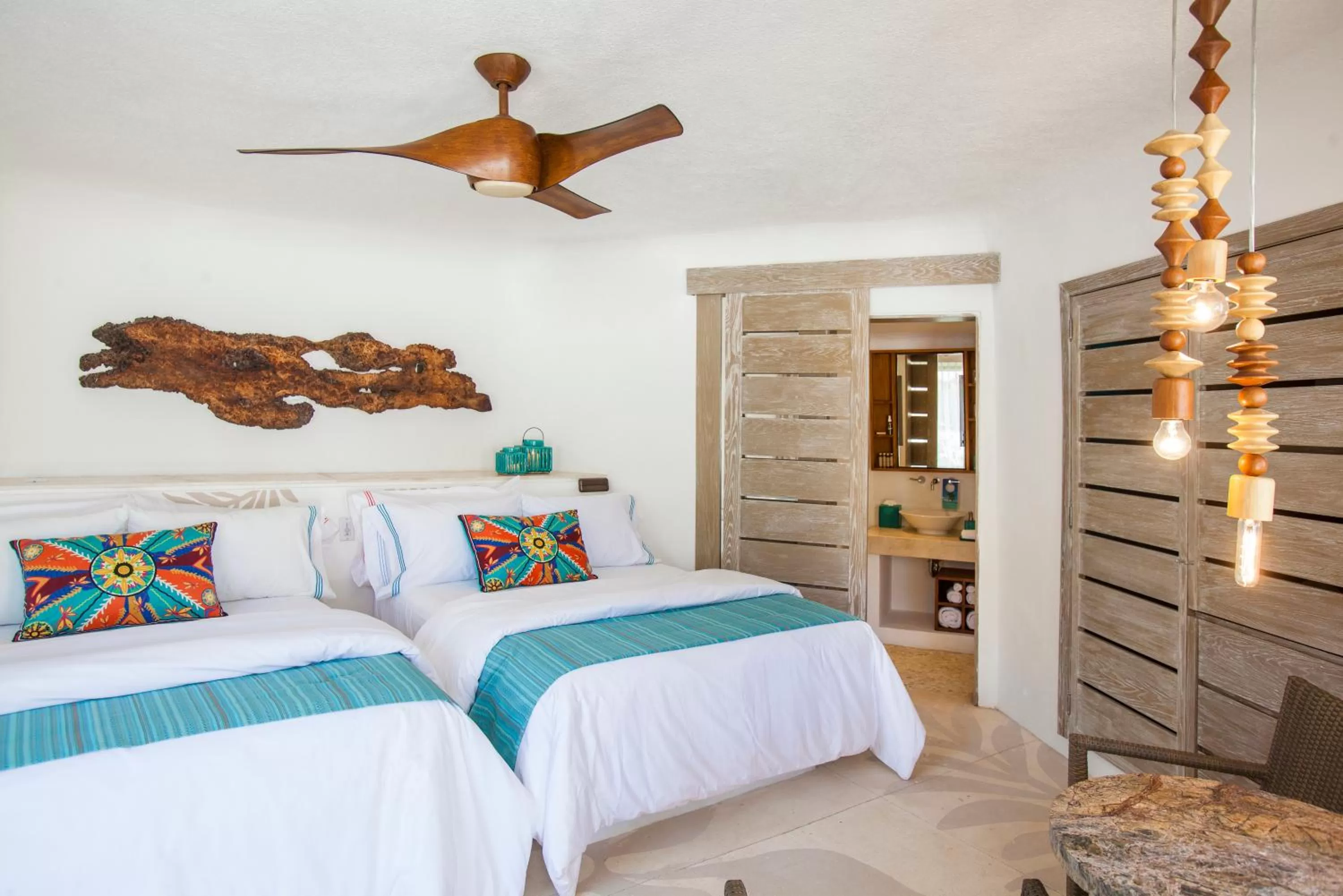 Bed in Mahekal Beach Front Resort & Spa