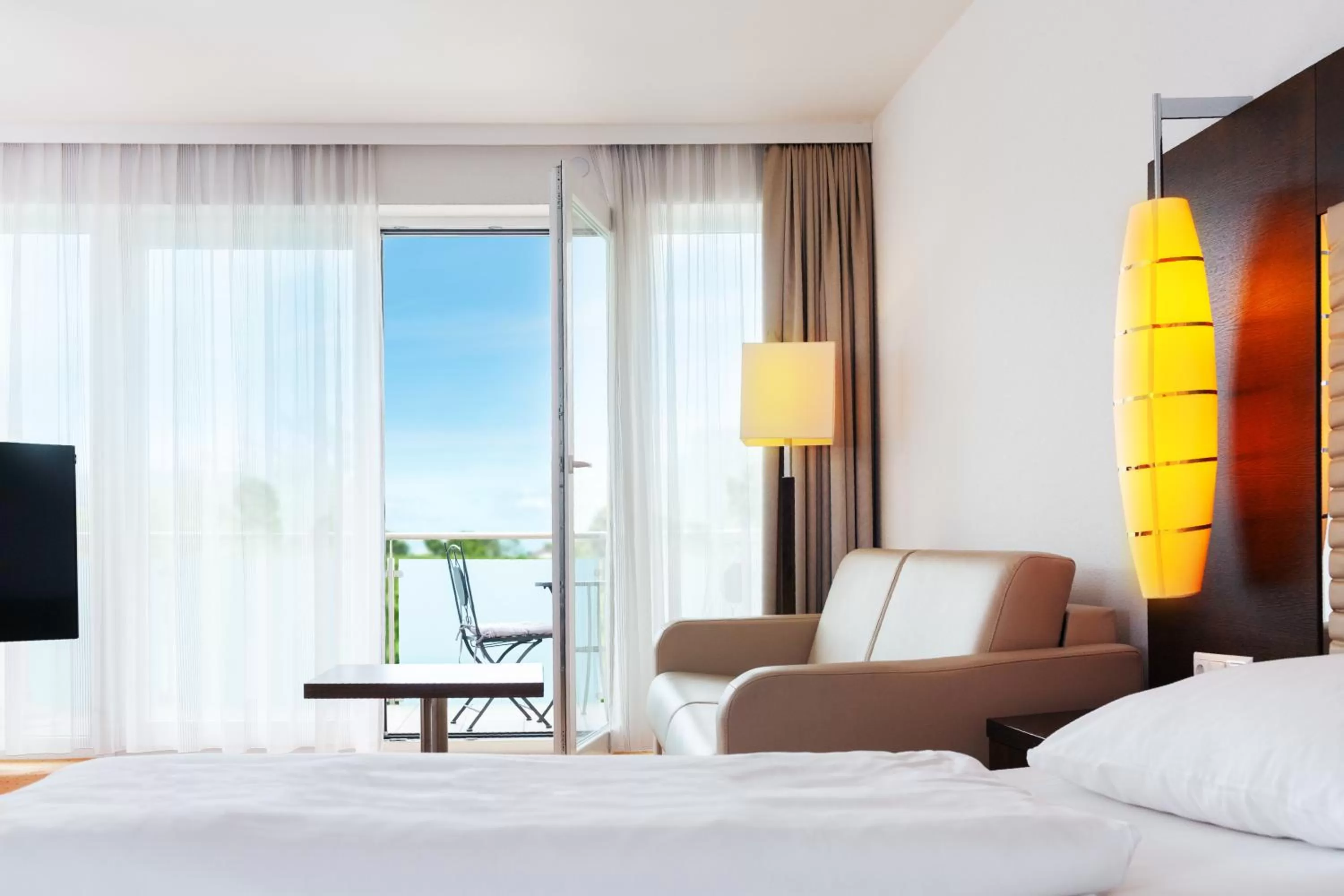 Seating area, Bed in Hotel Plattenwirt