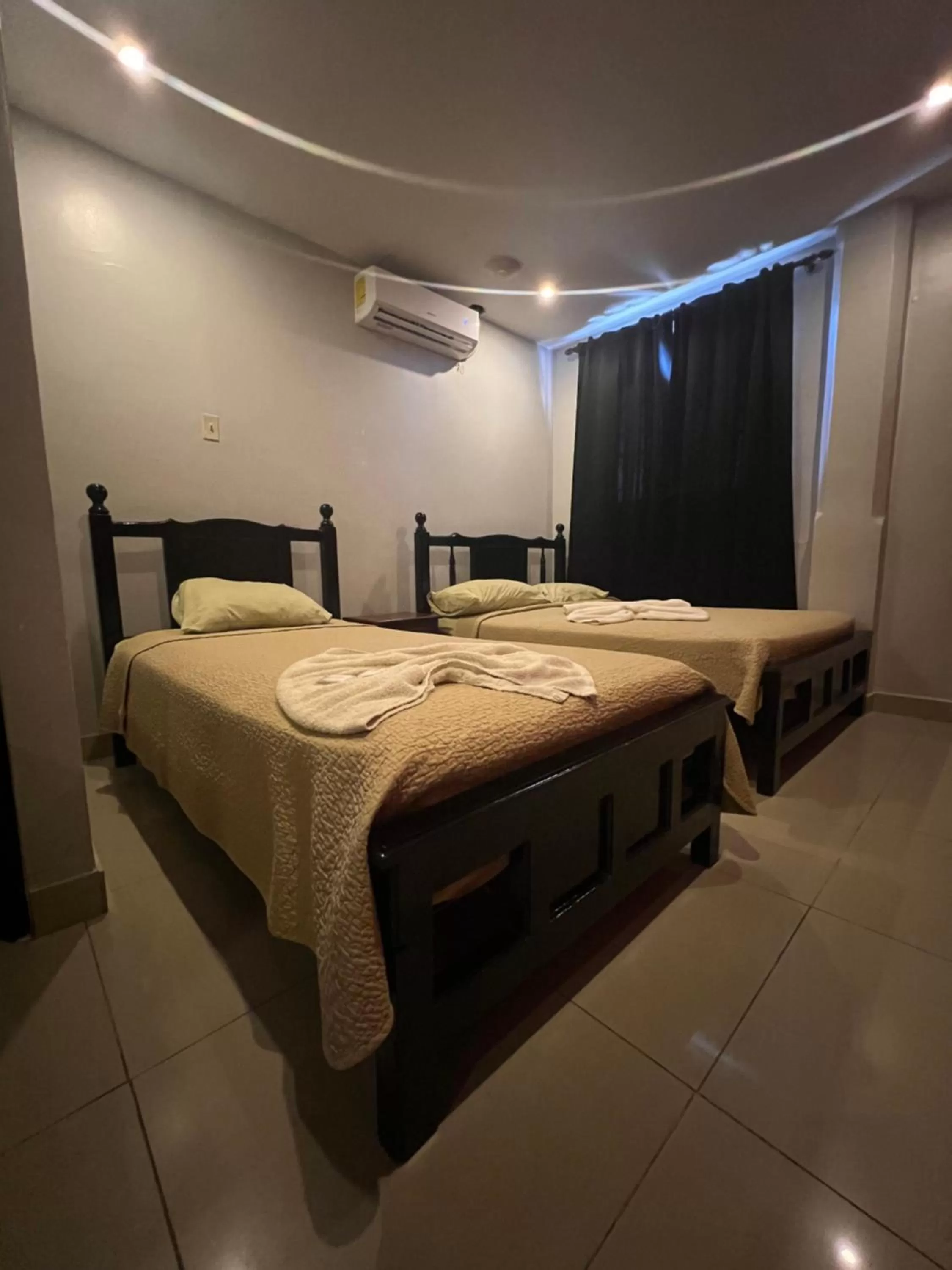 Photo of the whole room, Bed in La Cubana Hotel & Suites