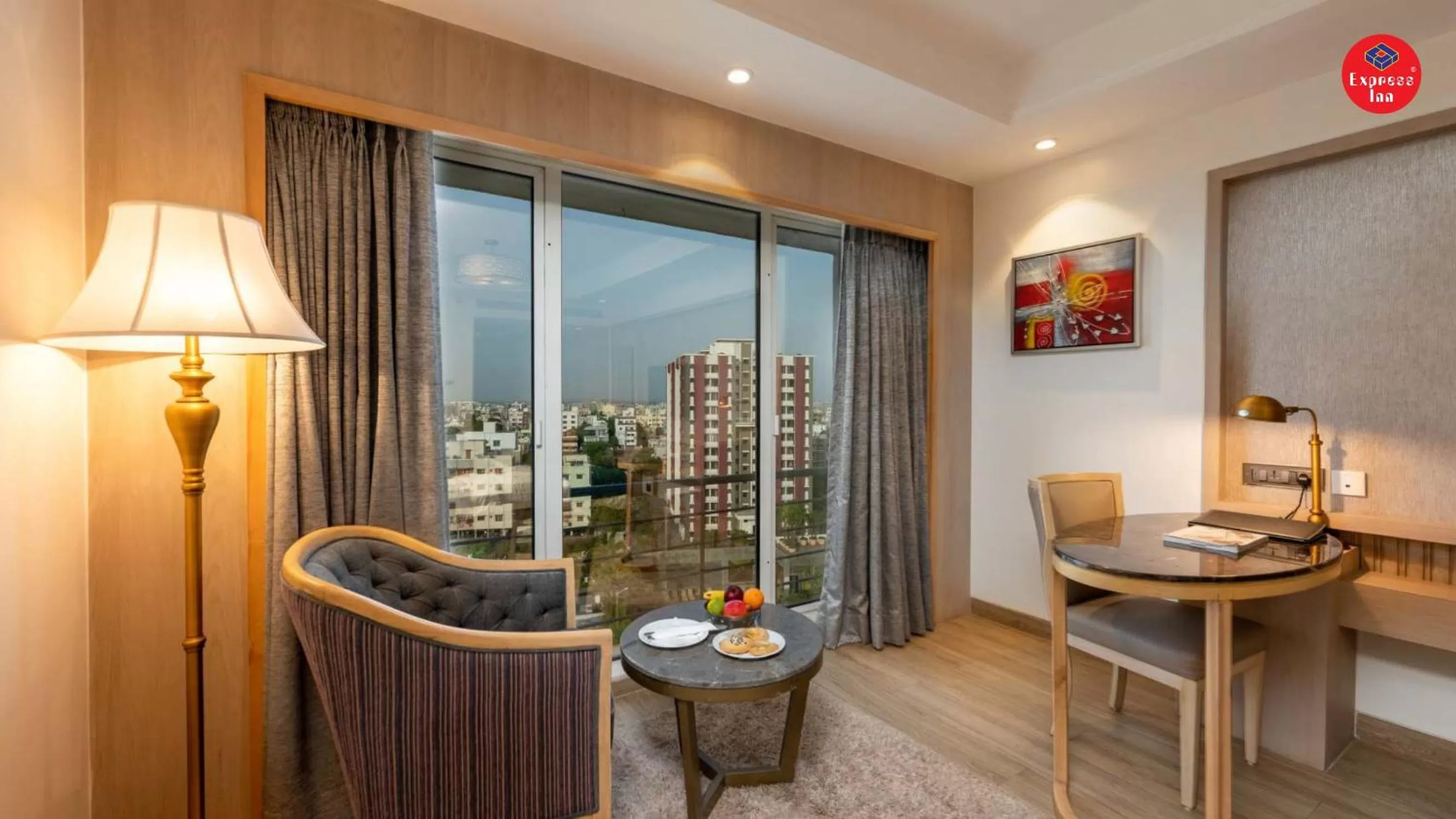 Seating area in Express Inn The Business Luxury Hotel