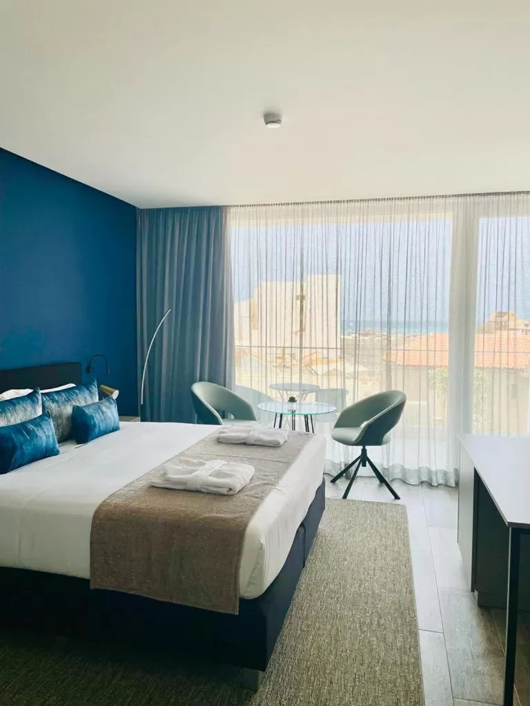 Bedroom, Bed in DESIGN SUITES Boutique Hotel - Adults Only