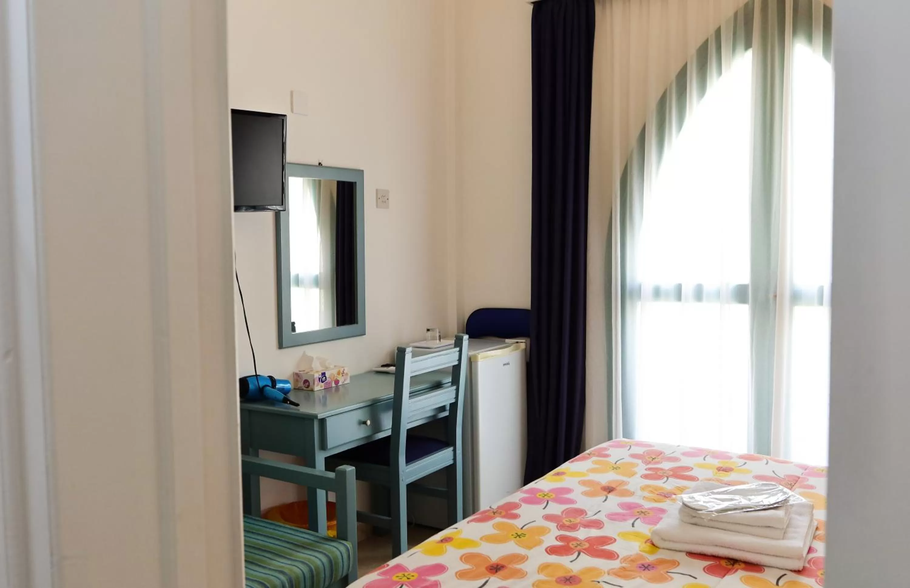 Bed in Axiothea Hotel