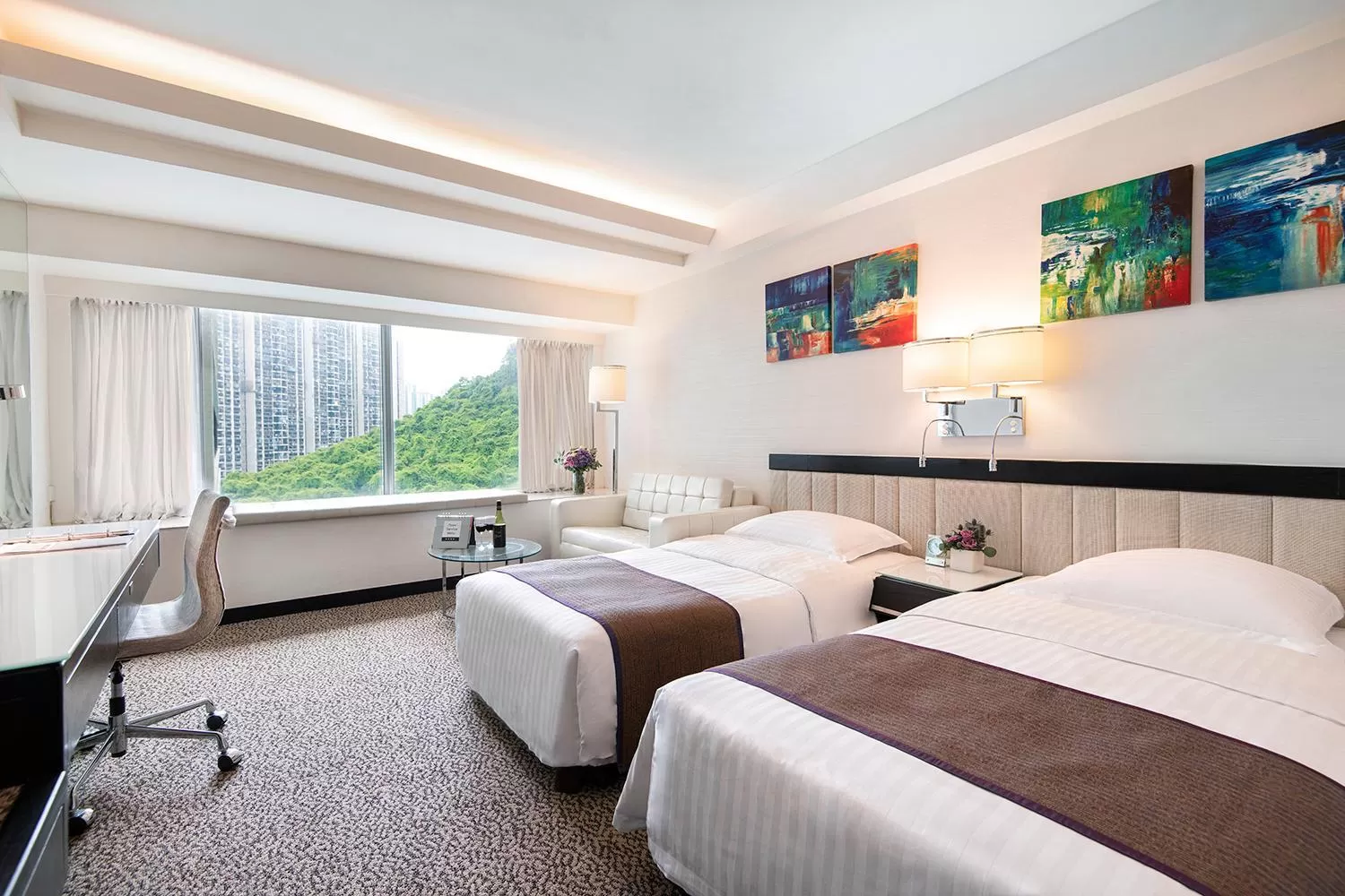 Bed in Regal Riverside Hotel