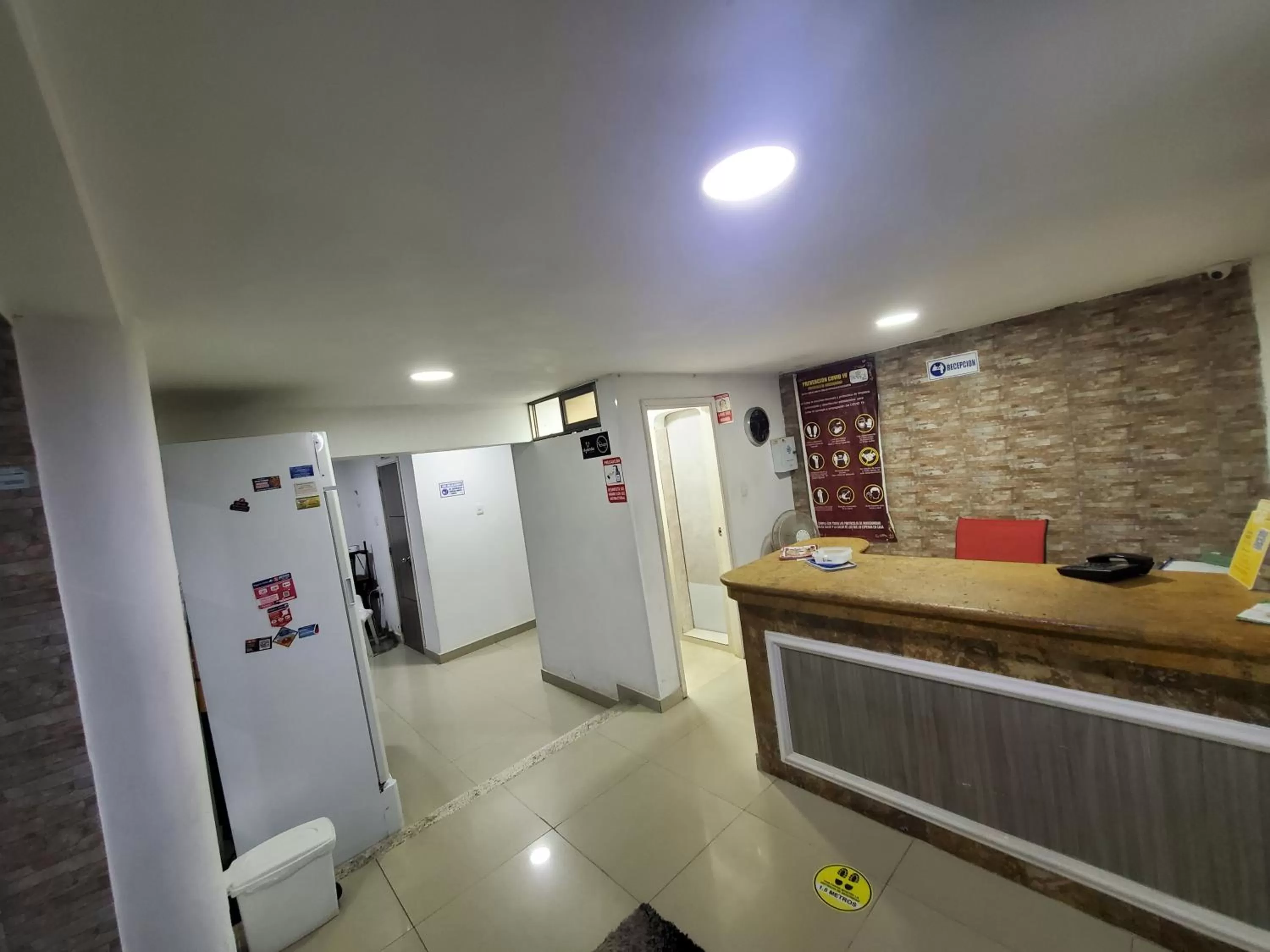 Lobby or reception, Kitchen/Kitchenette in Hotel Tamaca Real