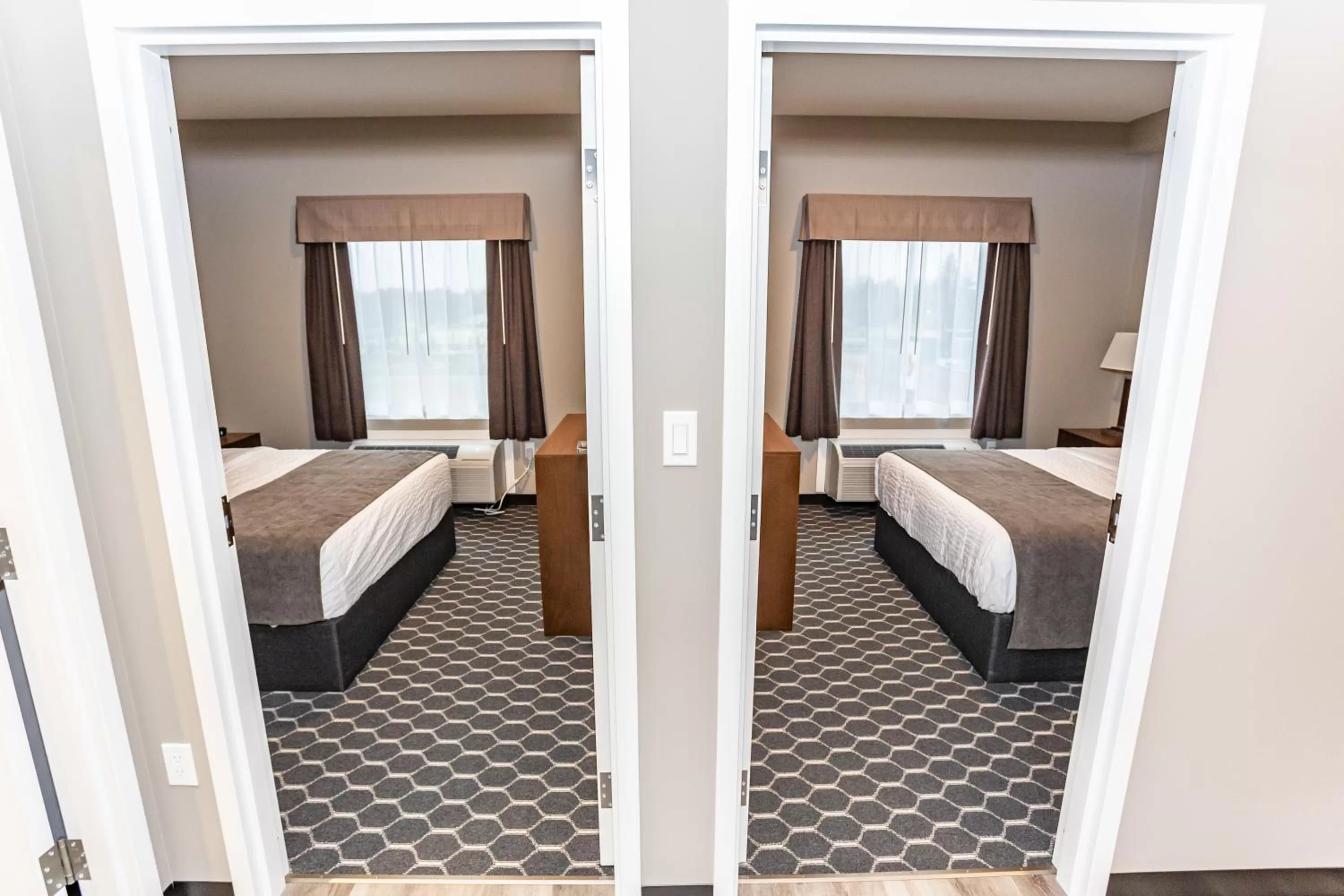 Bed in Carman Blue Crescent Hotel