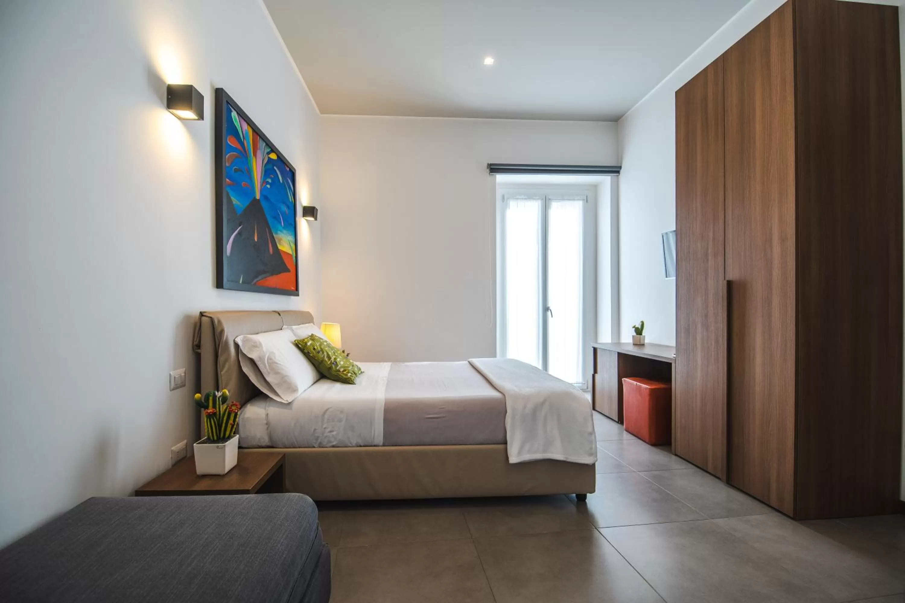 Photo of the whole room, Bed in Arco Dei Pinto