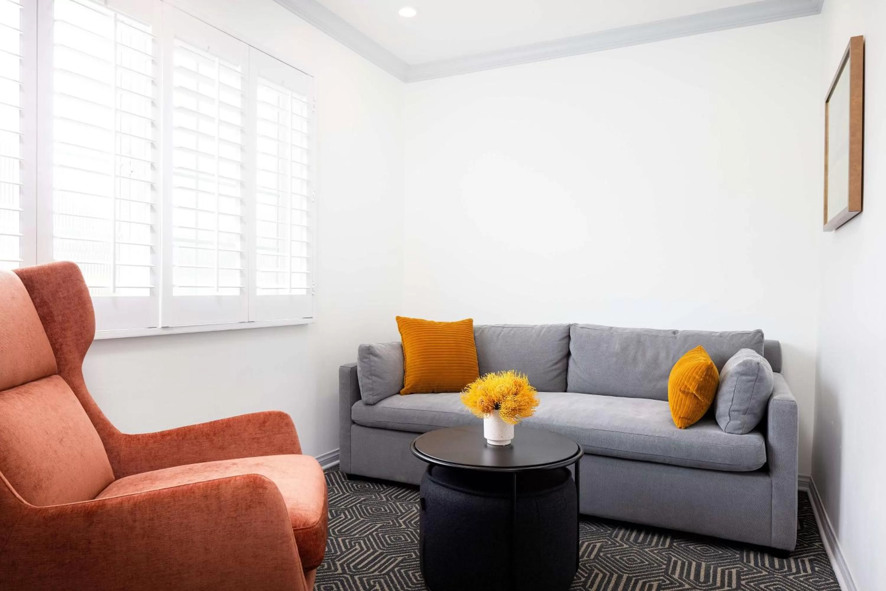 Living room in The Hadsten Solvang, Tapestry Collection by Hilton