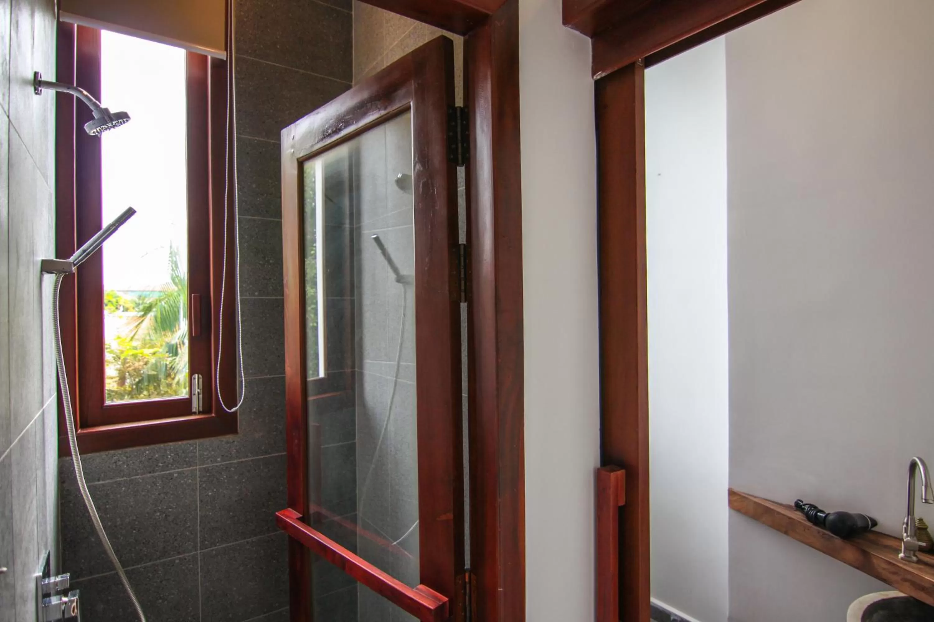 Bathroom in Sarina Hotel & Villa