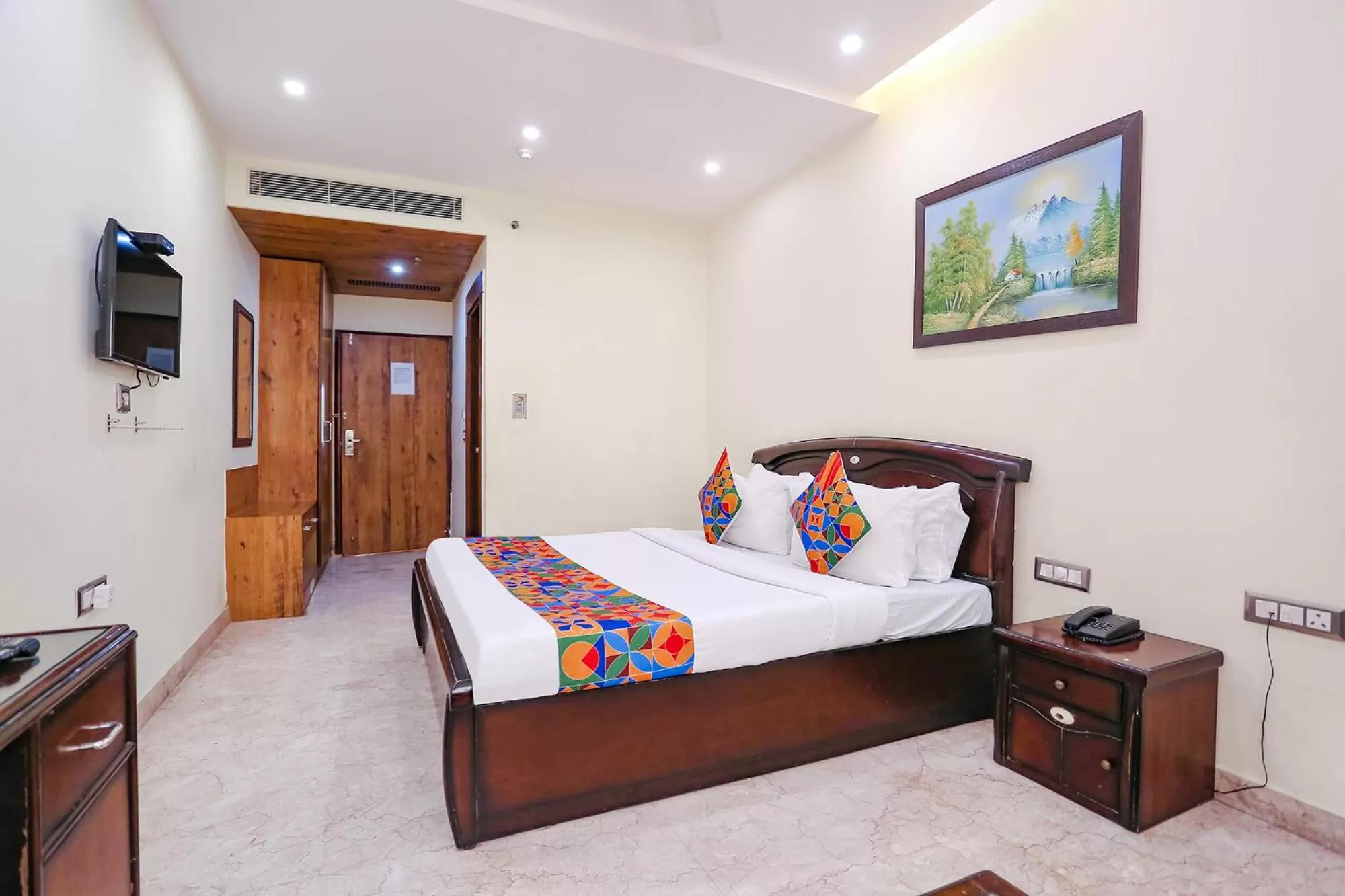 Communal lounge/ TV room, Bed in FabHotel F9 NSP - Near Pacific Mall Pitampura