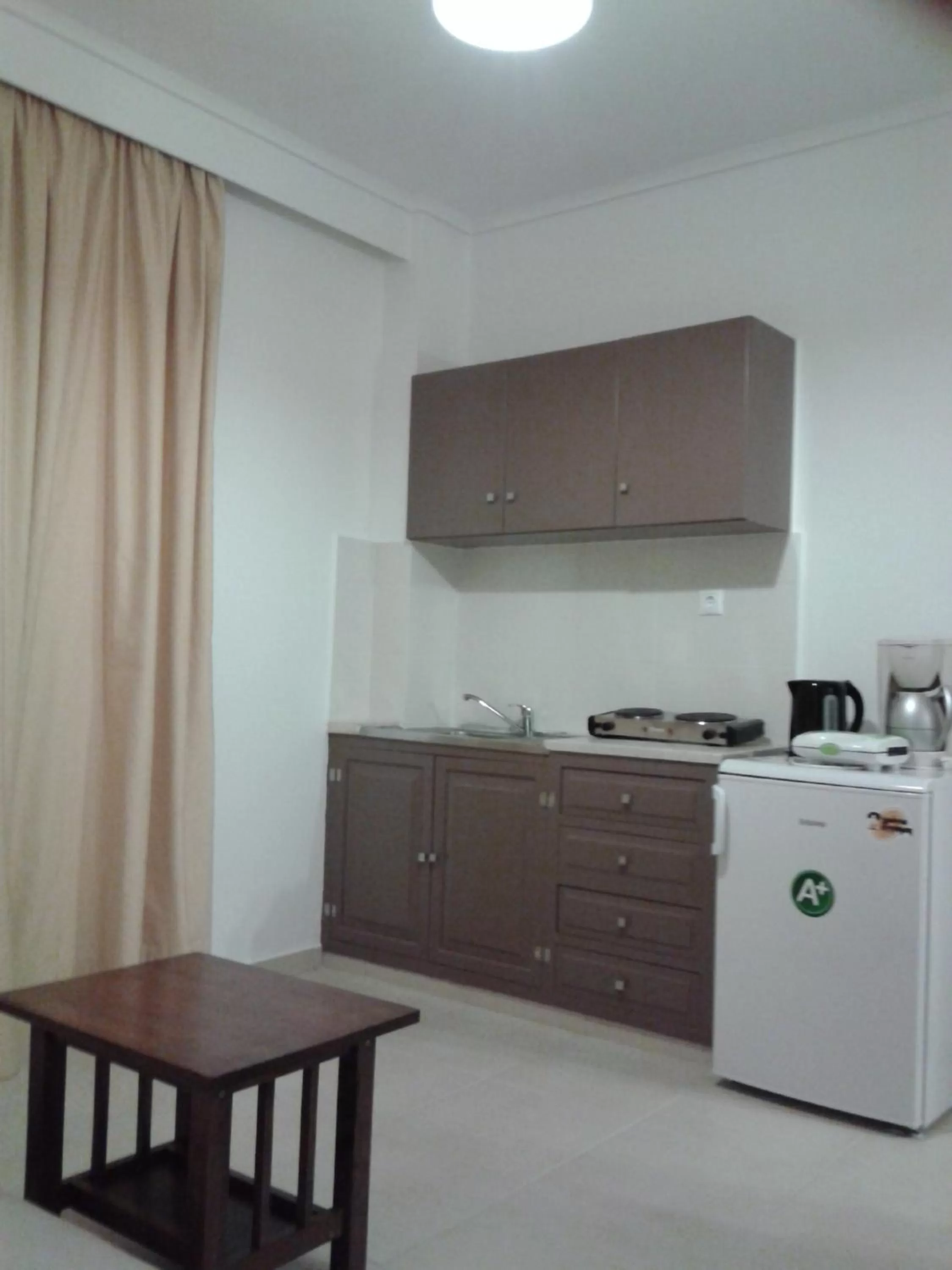 Kitchen or kitchenette in Fantasia Hotel Apartments